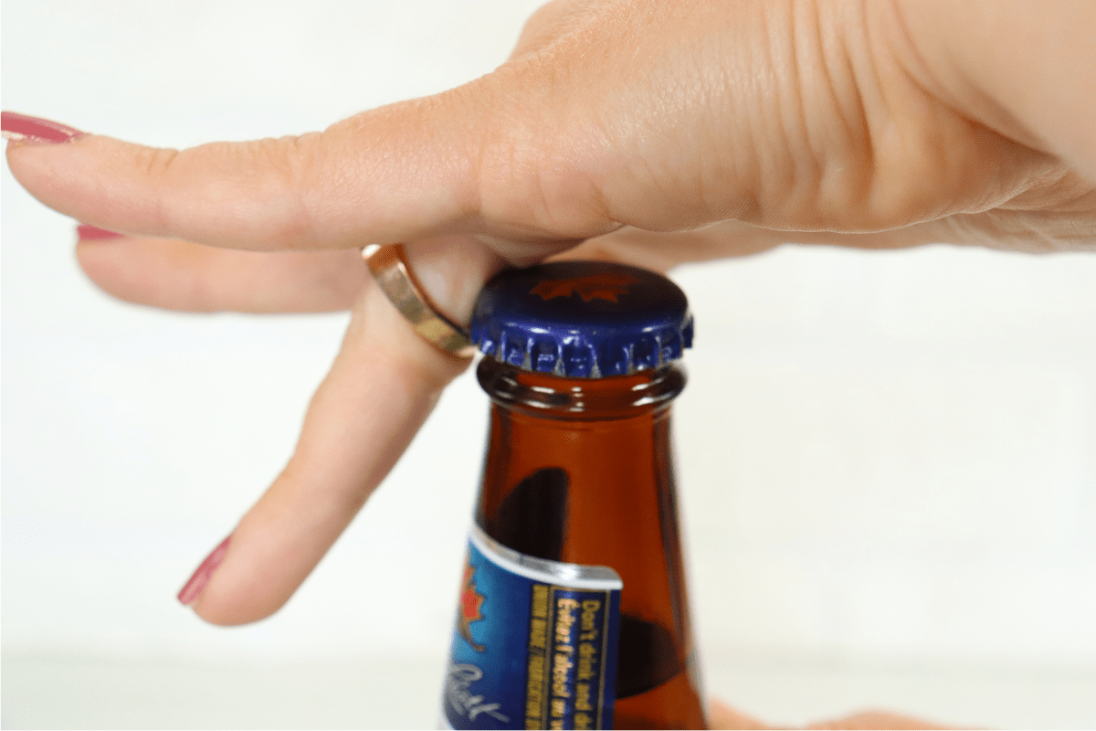 https://www.manmadediy.com/wp-content/uploads/sites/52/2022/06/Opening-a-Beer-with-a-Ring-14543.png