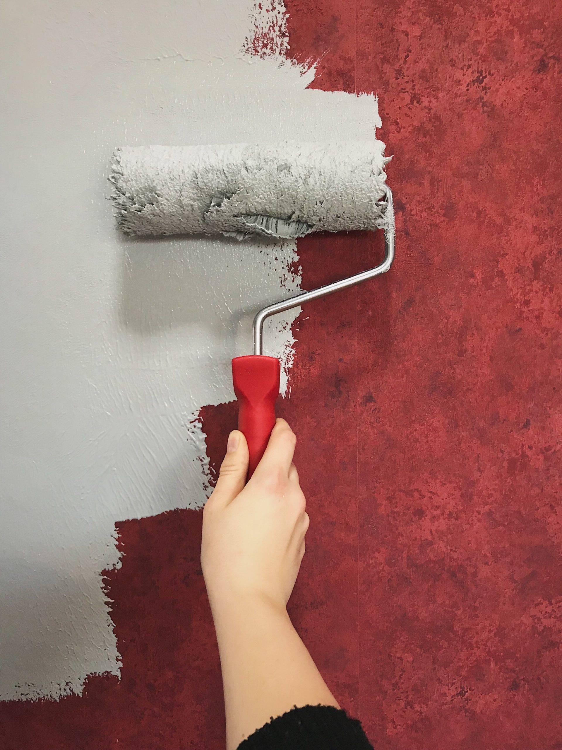Adhesive Wallpaper Glue Applying Using Roller Close Up Photo