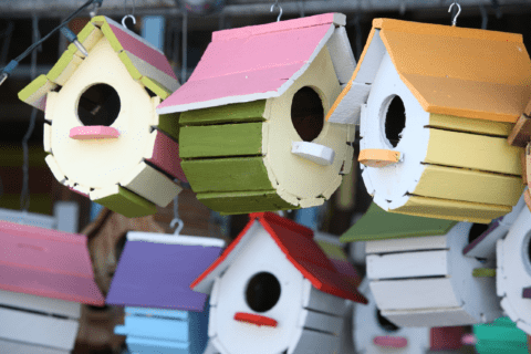 An assortment of colorful birdhouses