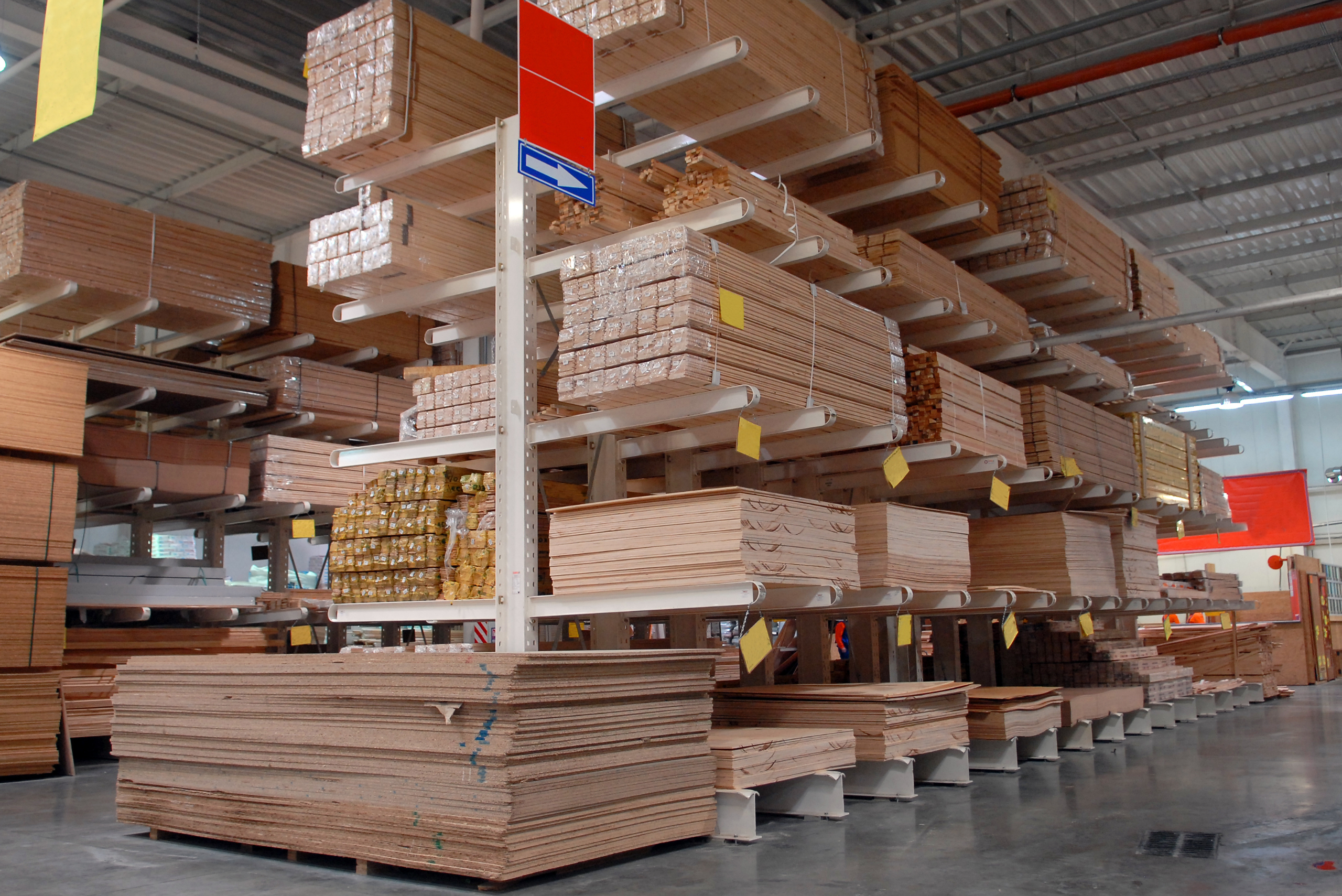 A warehouse full of plywood and particleboard sheets.