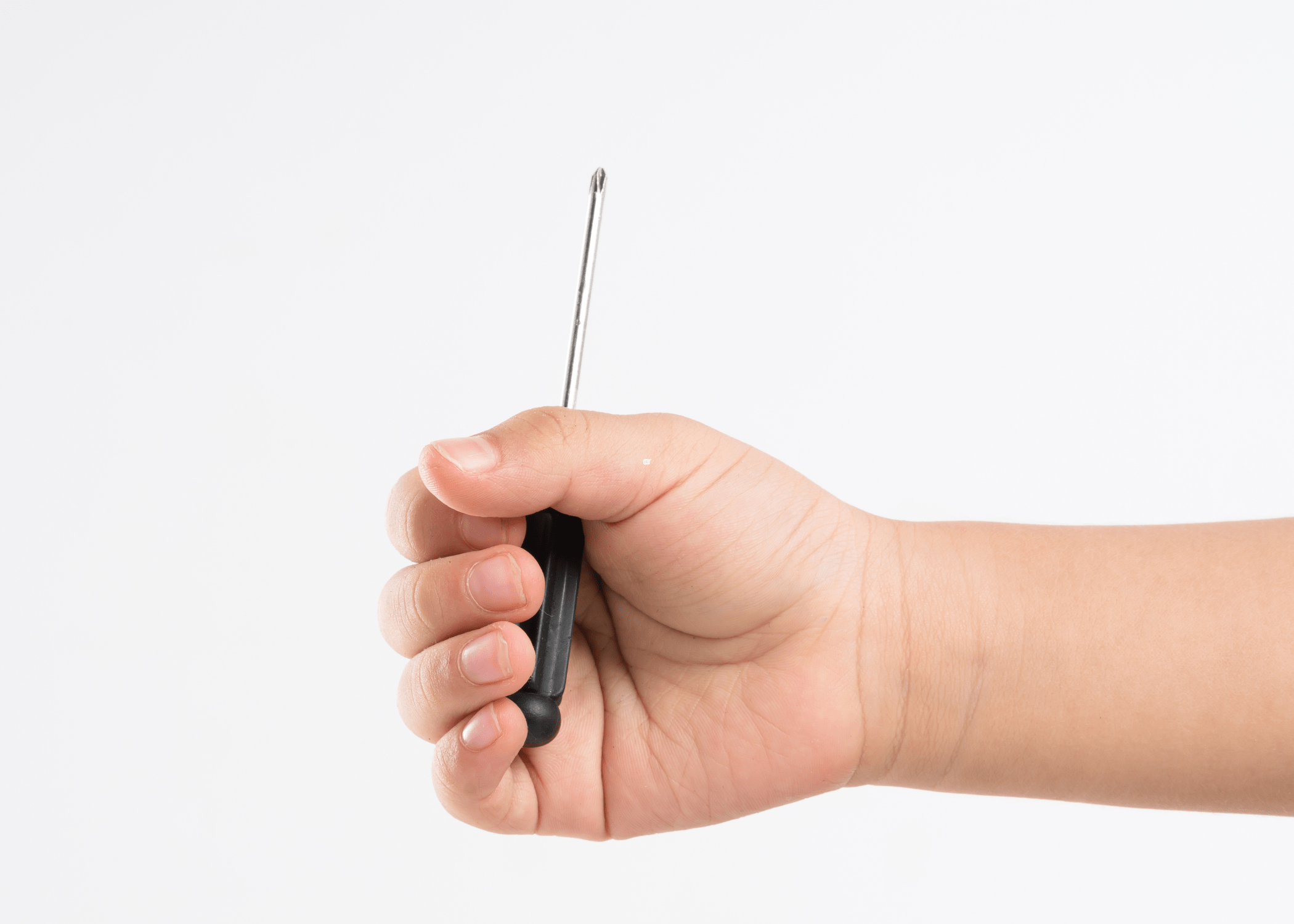 hand holding small screwdriver