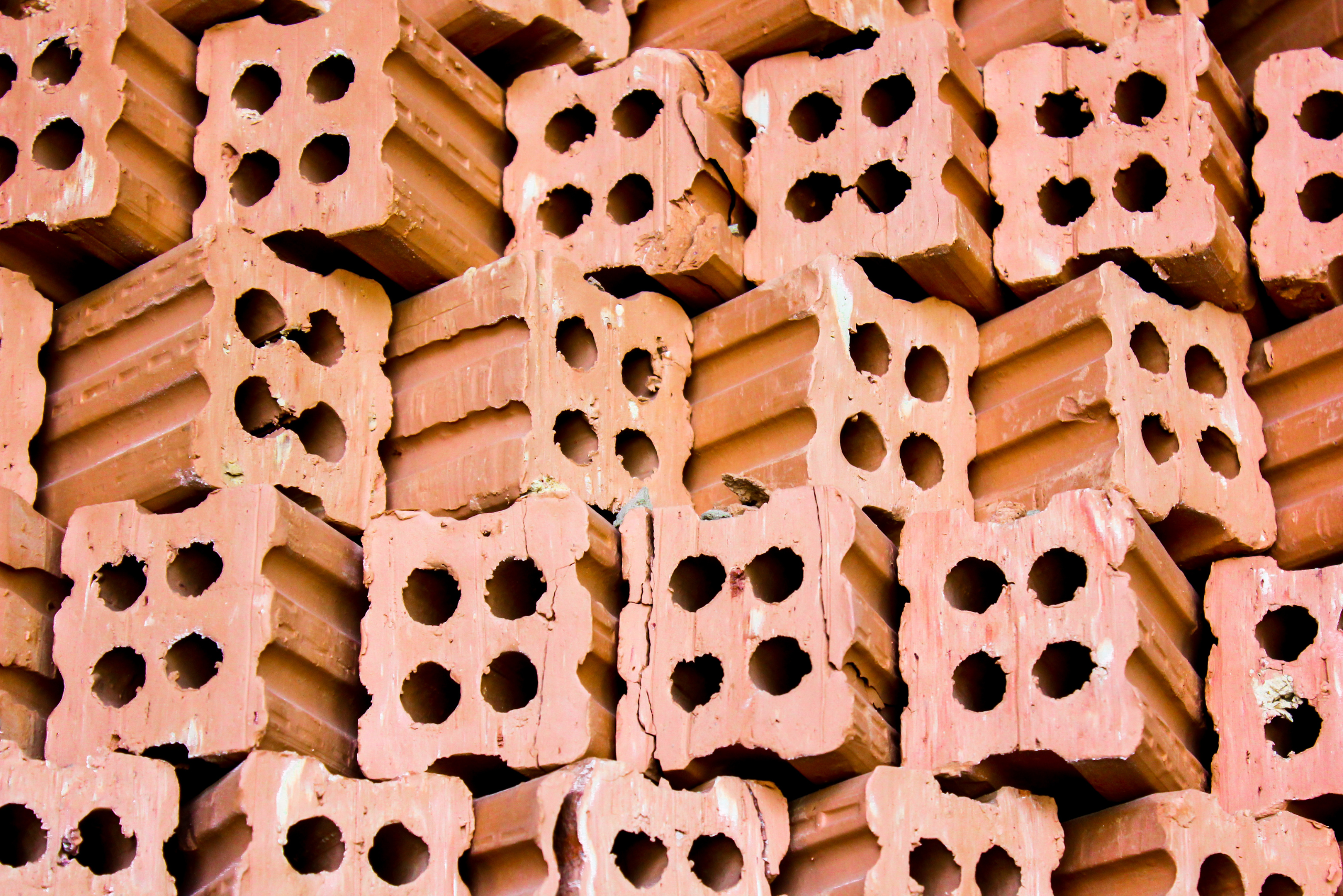 Stack of red fire bricks.