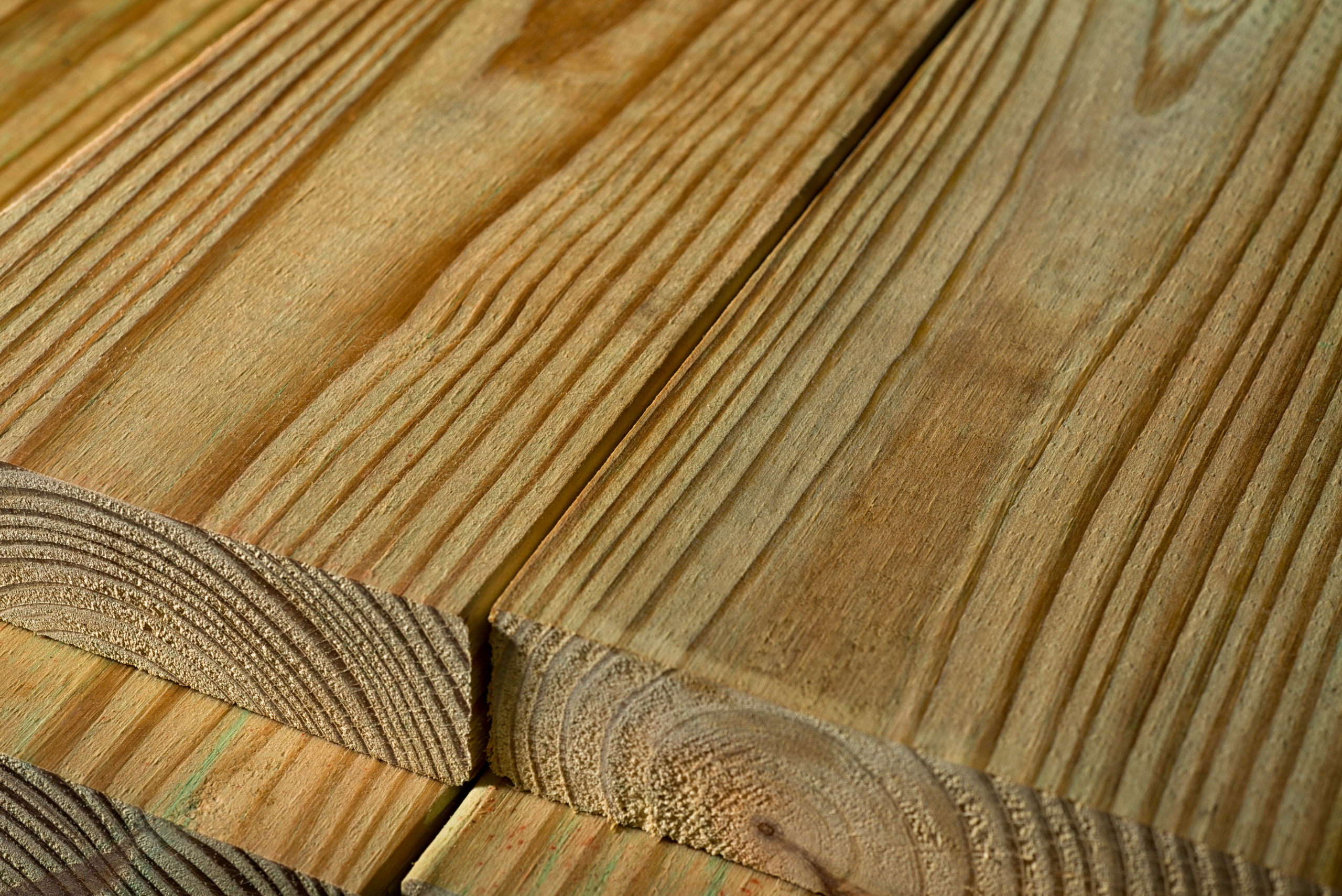 A stack of pressure treated wood.