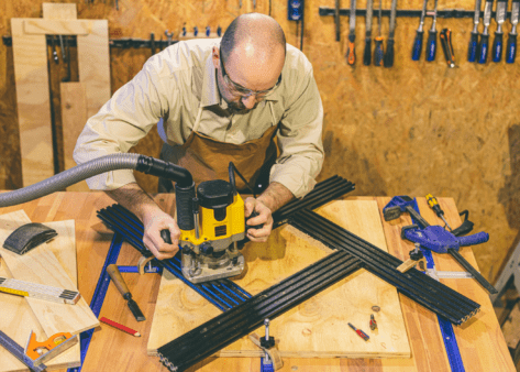 man using a router