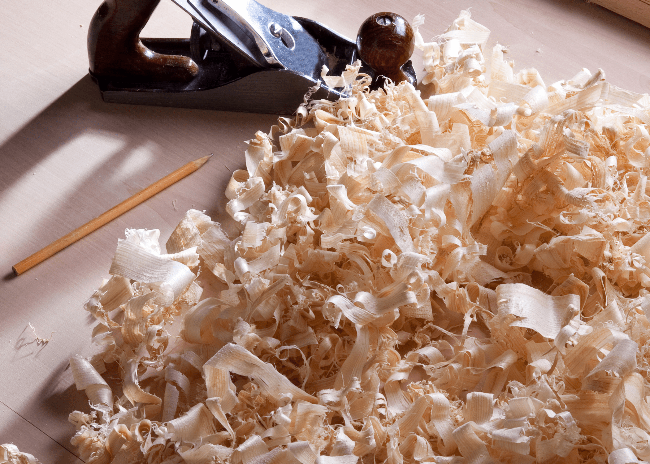 sawdust on workspace with planer
