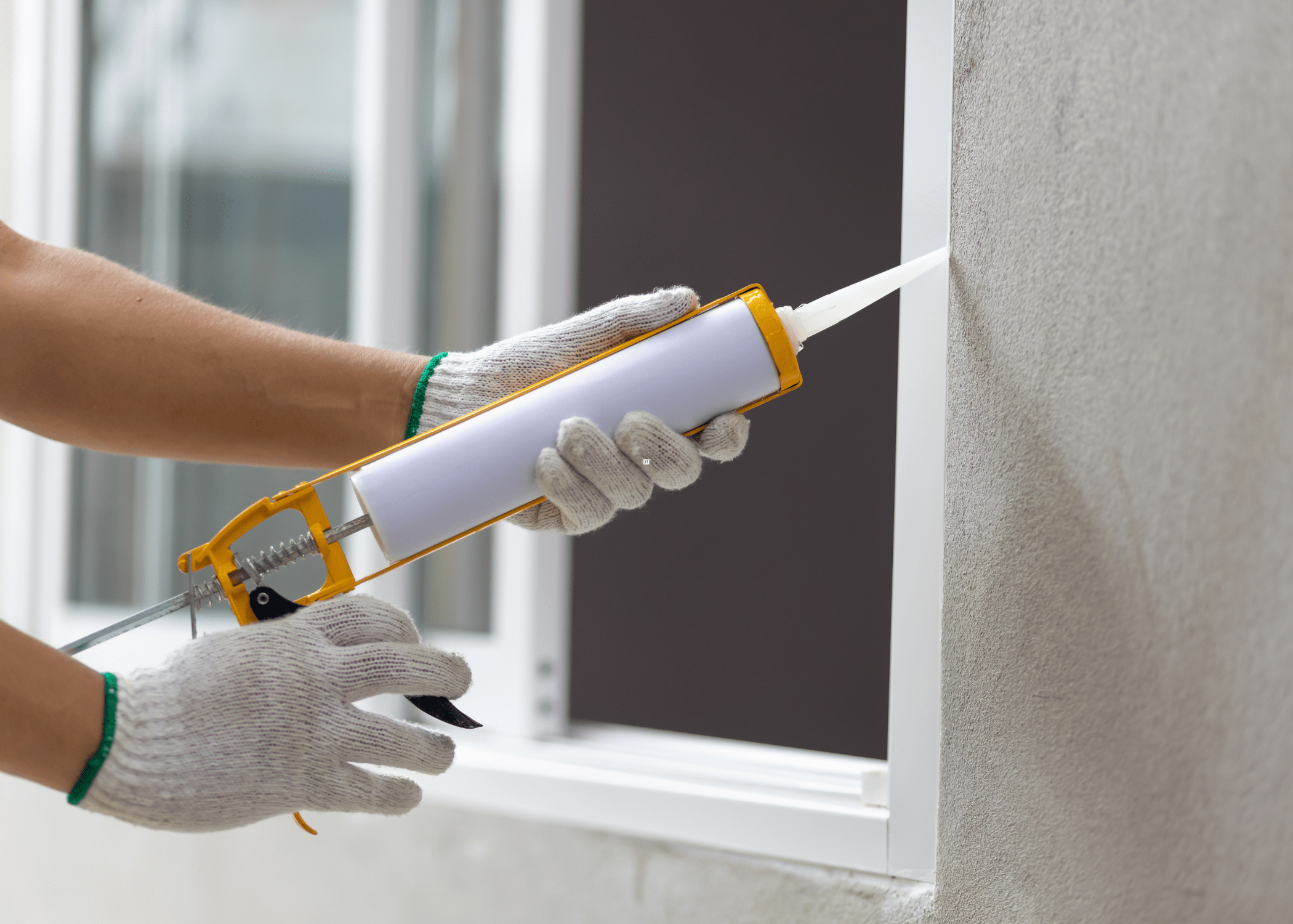 sealing window with caulk