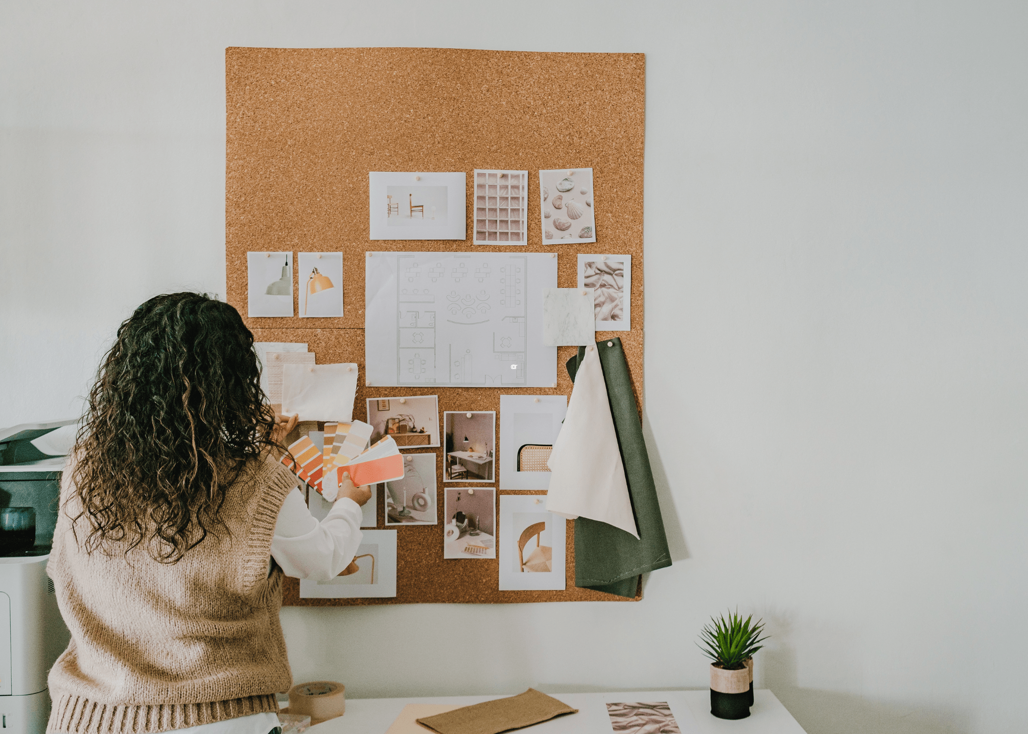 woman creating a vision board