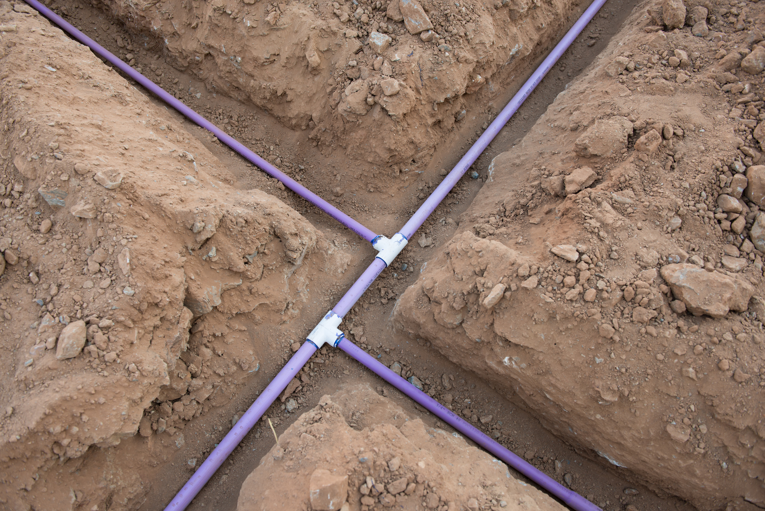 A sprinkler system pipes in the ground.