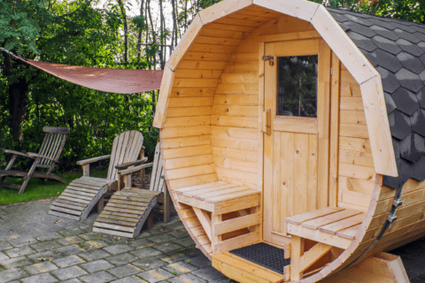 Circular entrance of a wooden sauna.