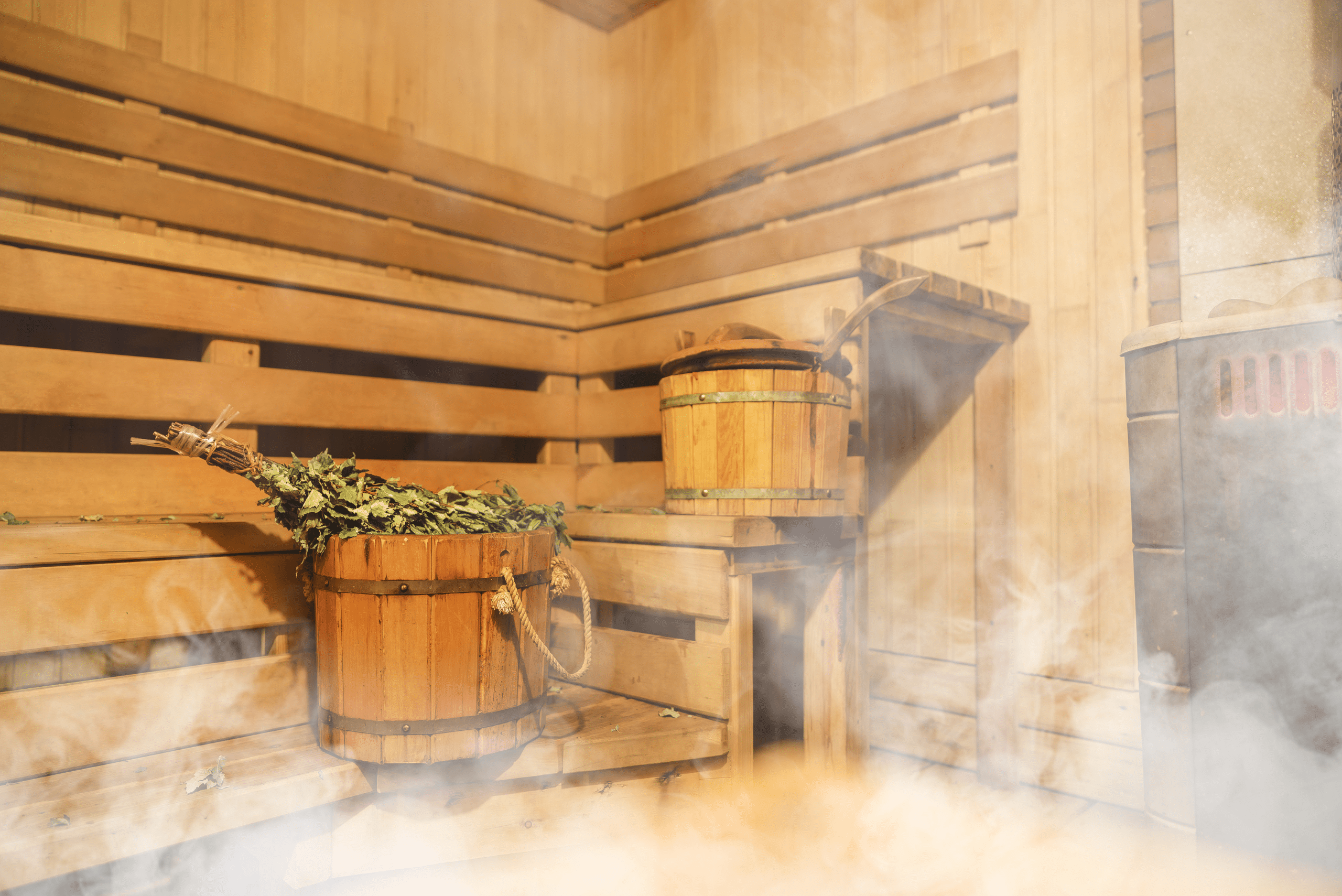 Steamy interior of a sauna made of wood.