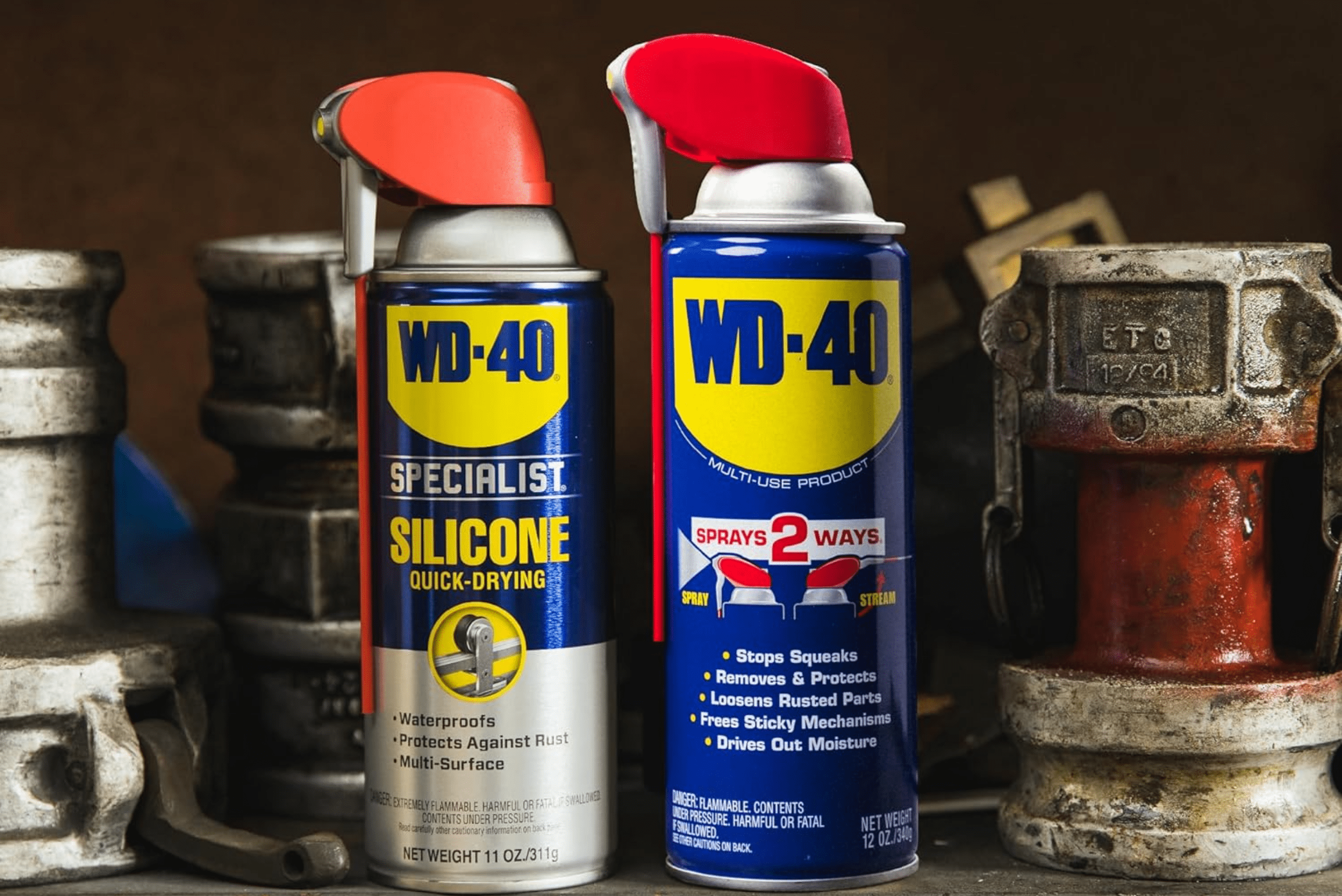 Two spray cans of WD-40.