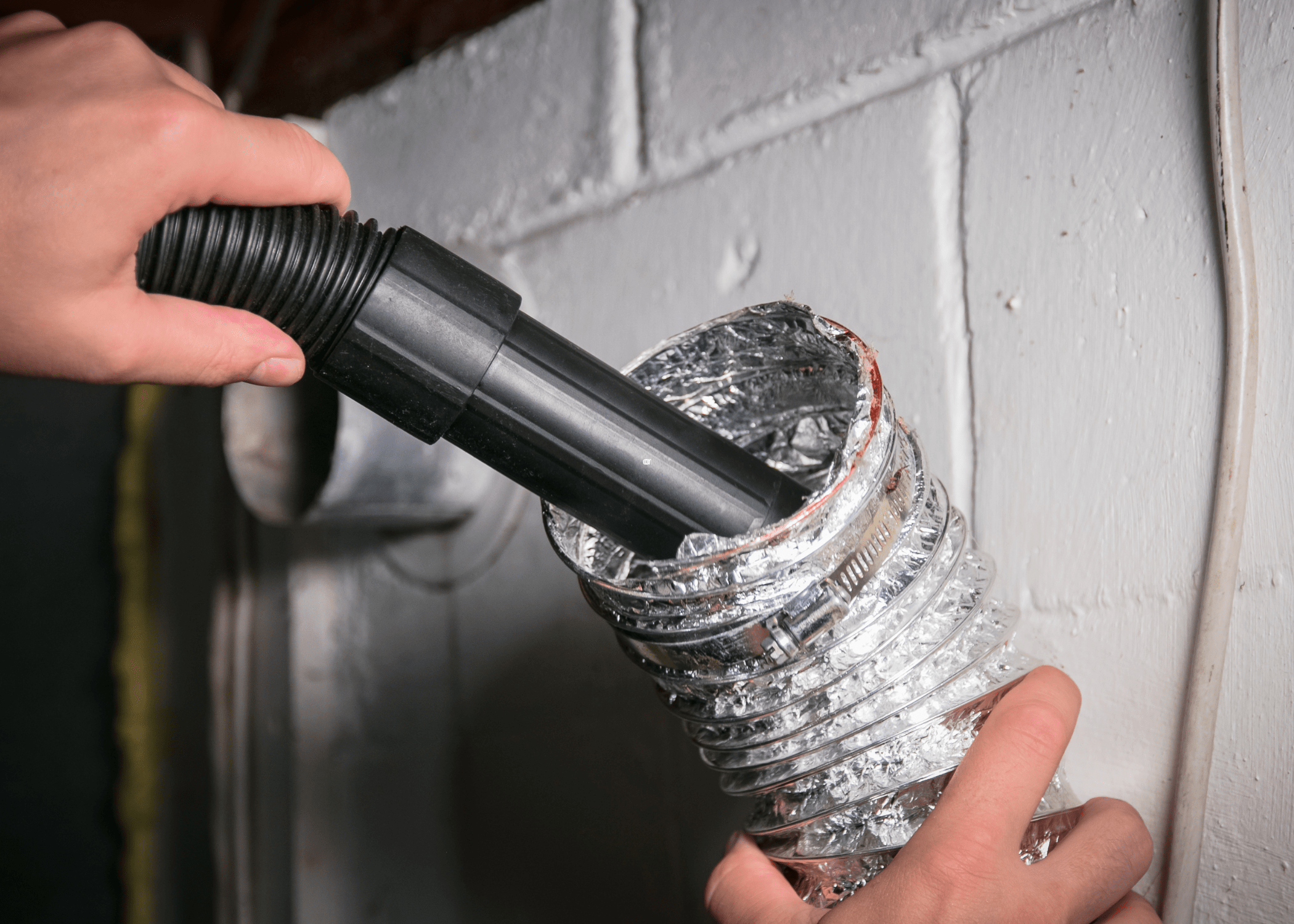 using a vacuum to clean out dryer vent