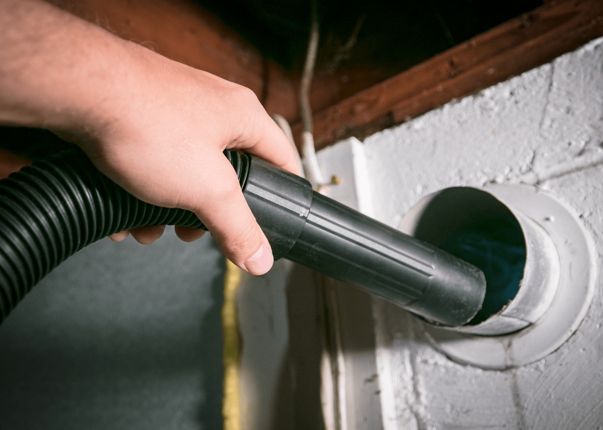 using a vacuum to clean out dryer vent