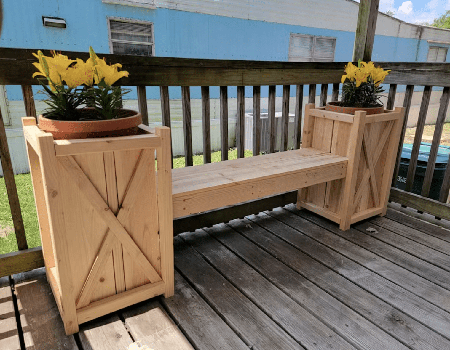 wood bench with planter boxes