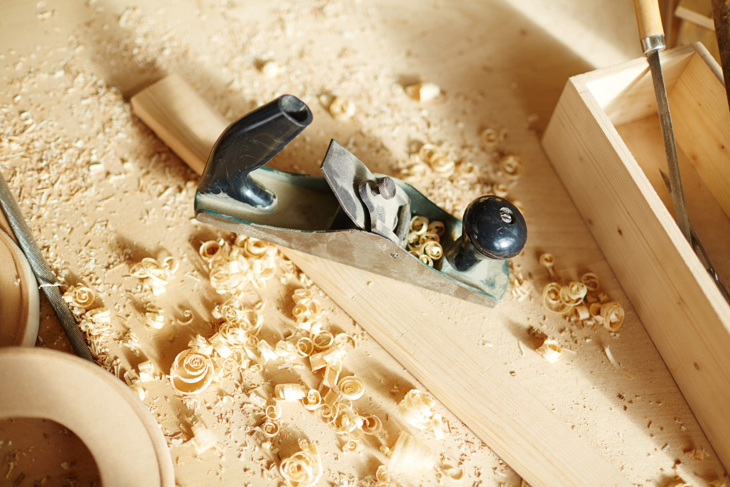 A work bench with wood shavings