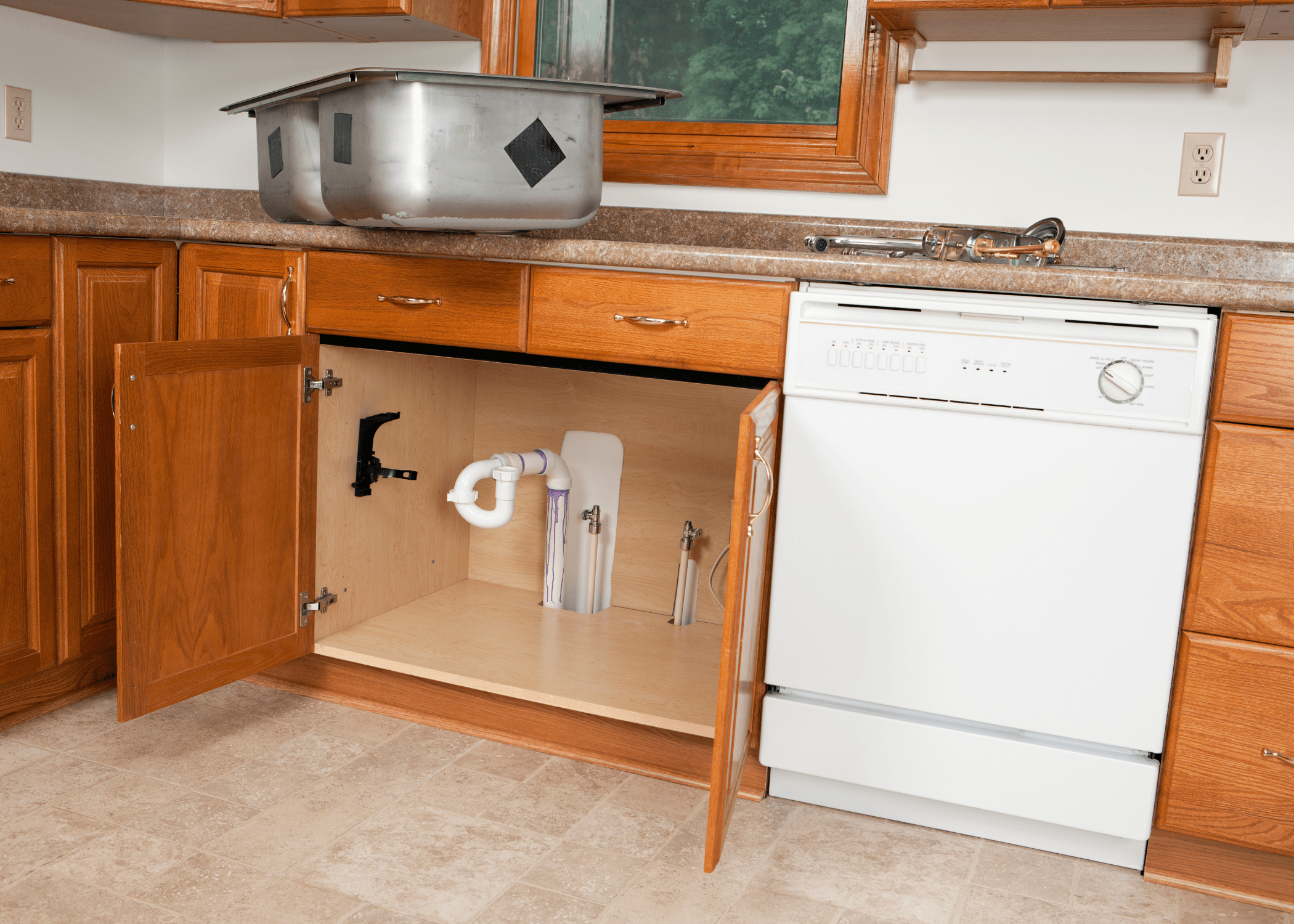 Stainless steel sink on top of countertop