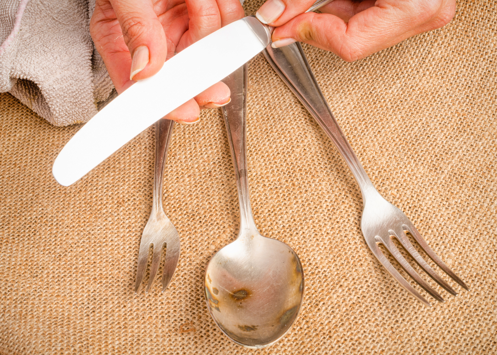 polishing silverware