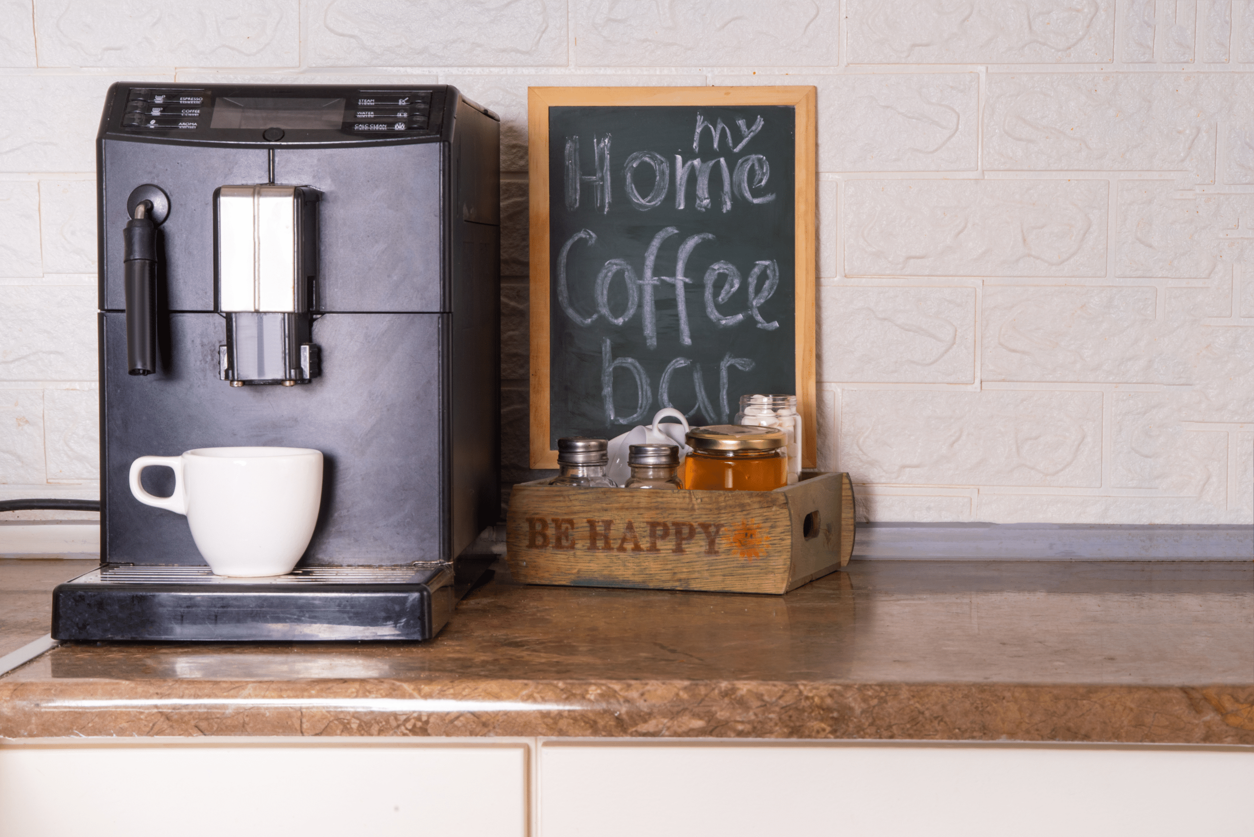 A coffee station with sign.