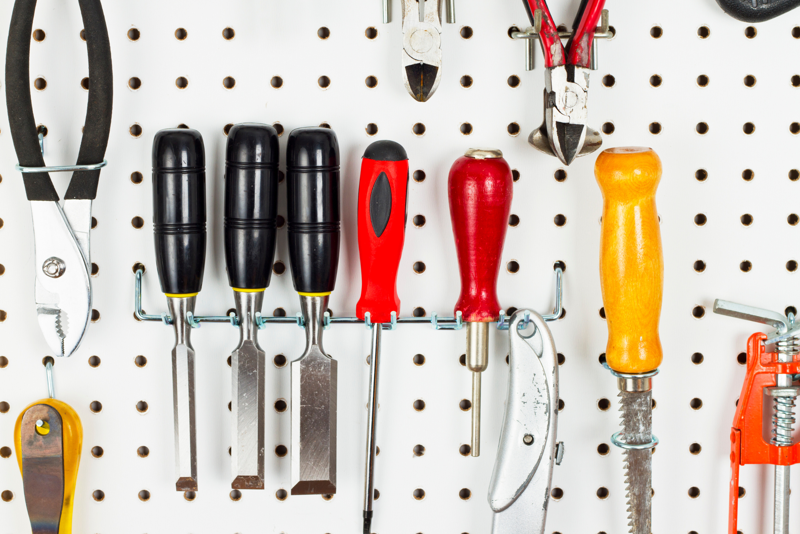 Pegboard used for organizing tools.