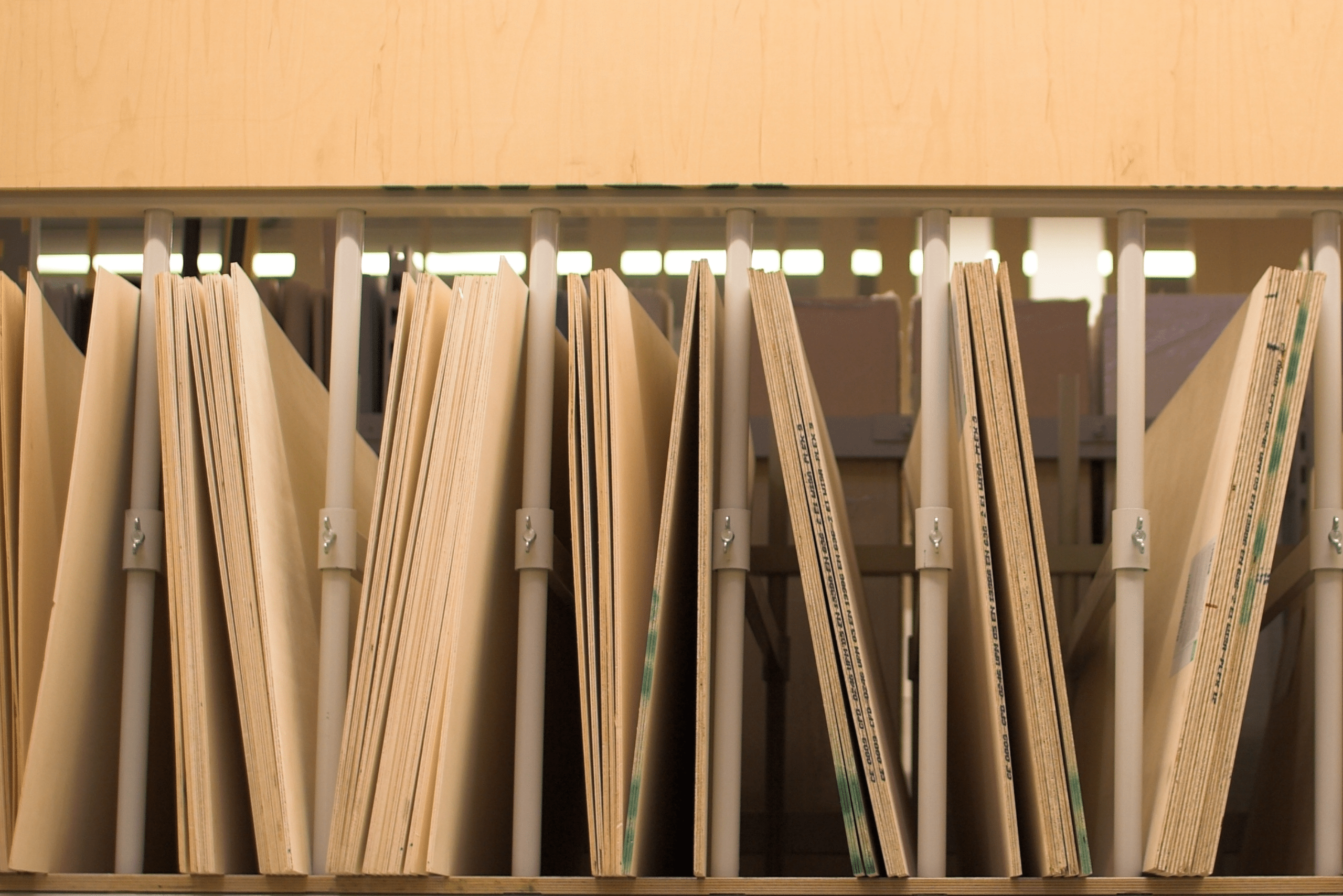 A stack of different sheets of plywood.