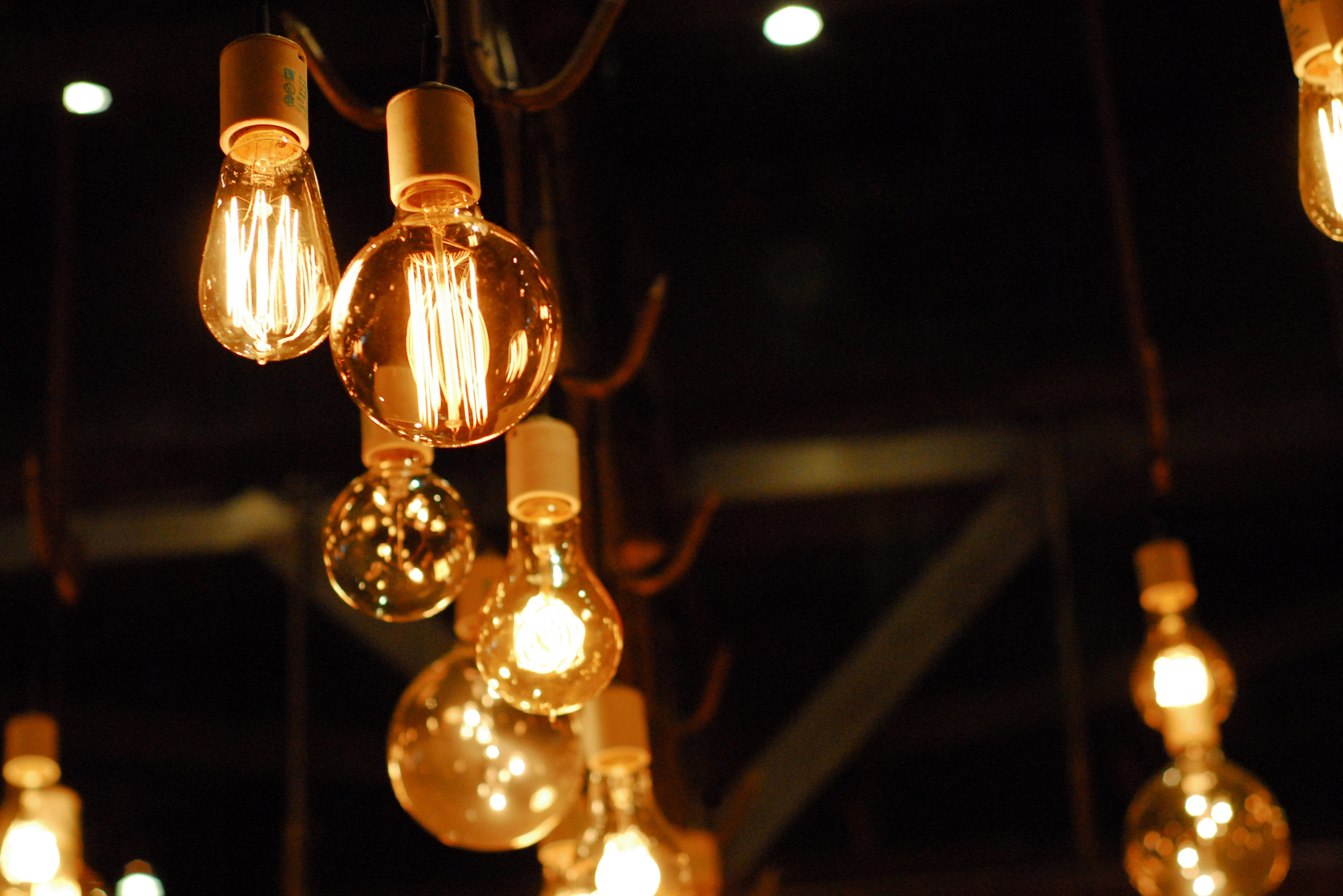 String incandescent bulbs outdoor lit up.