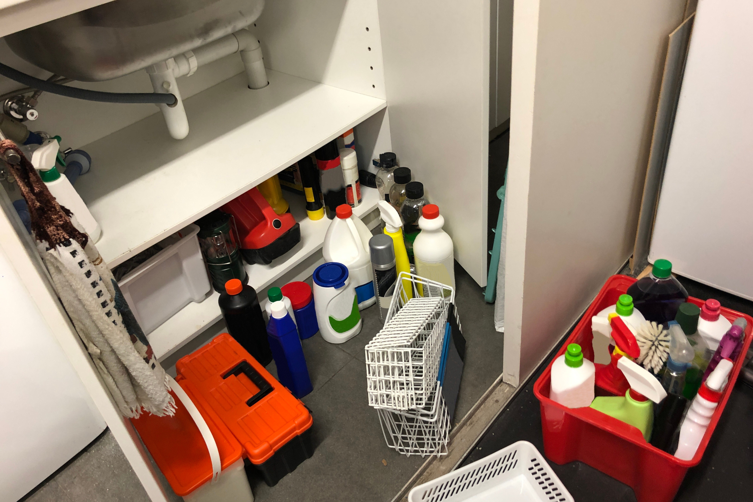 Decluttering under the sink.