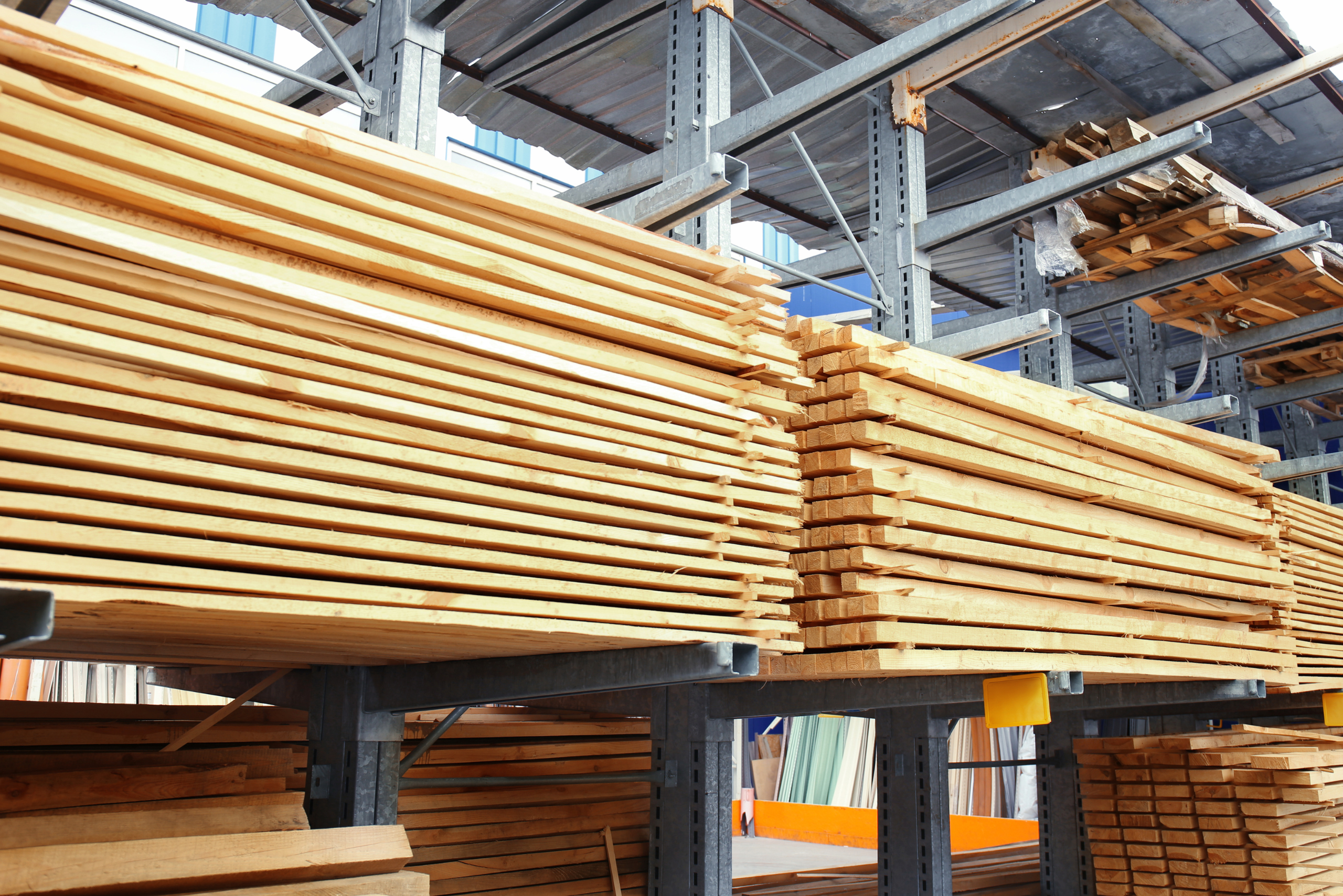 Warehouse with stacks of wood.