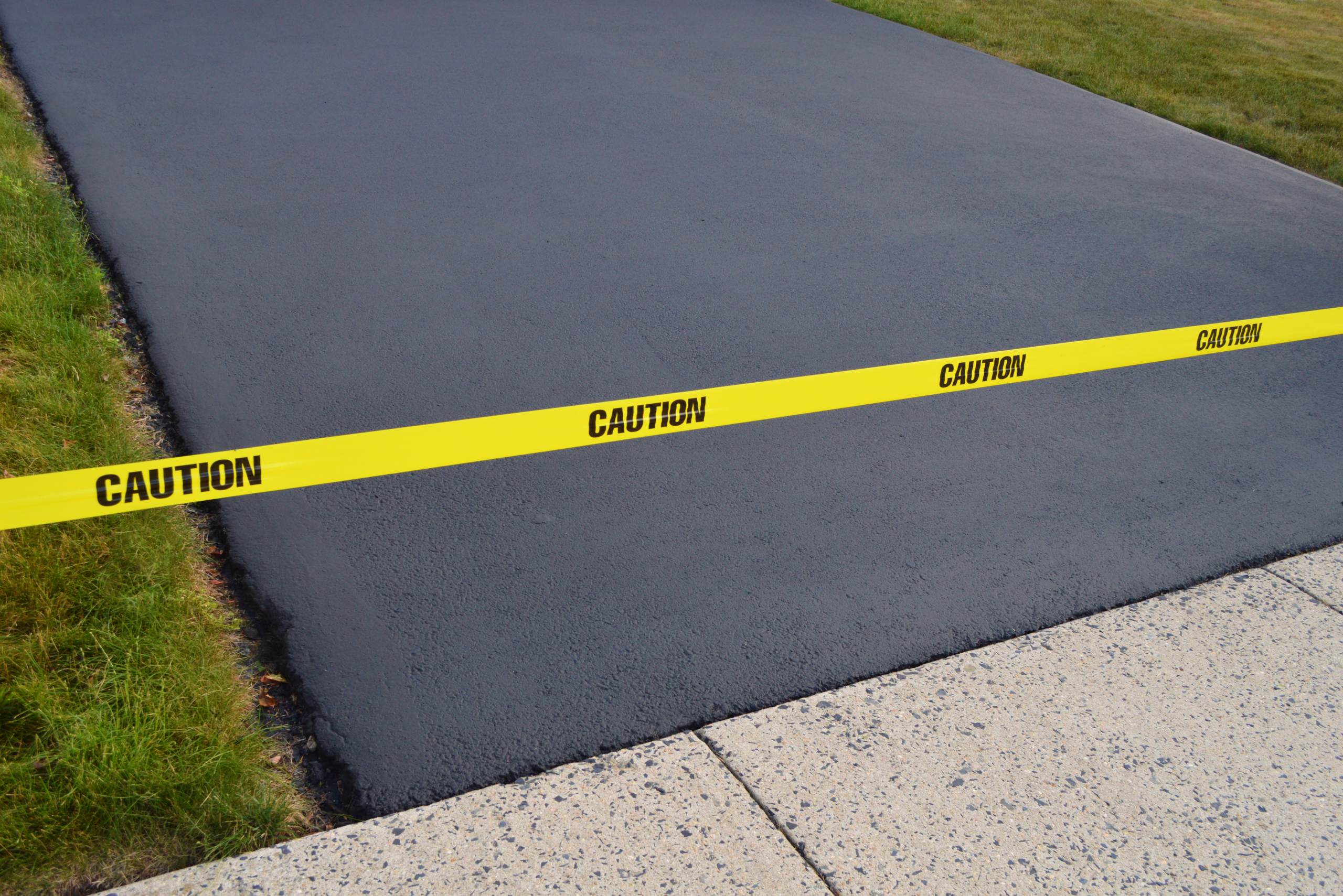 Freshly sealed driveway.