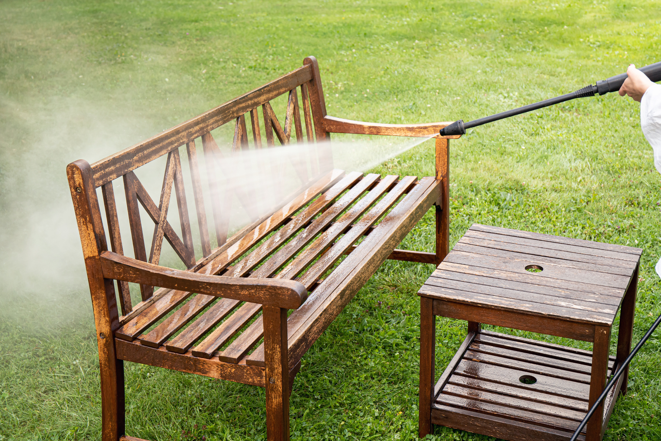 Pressure washing patio furniture.