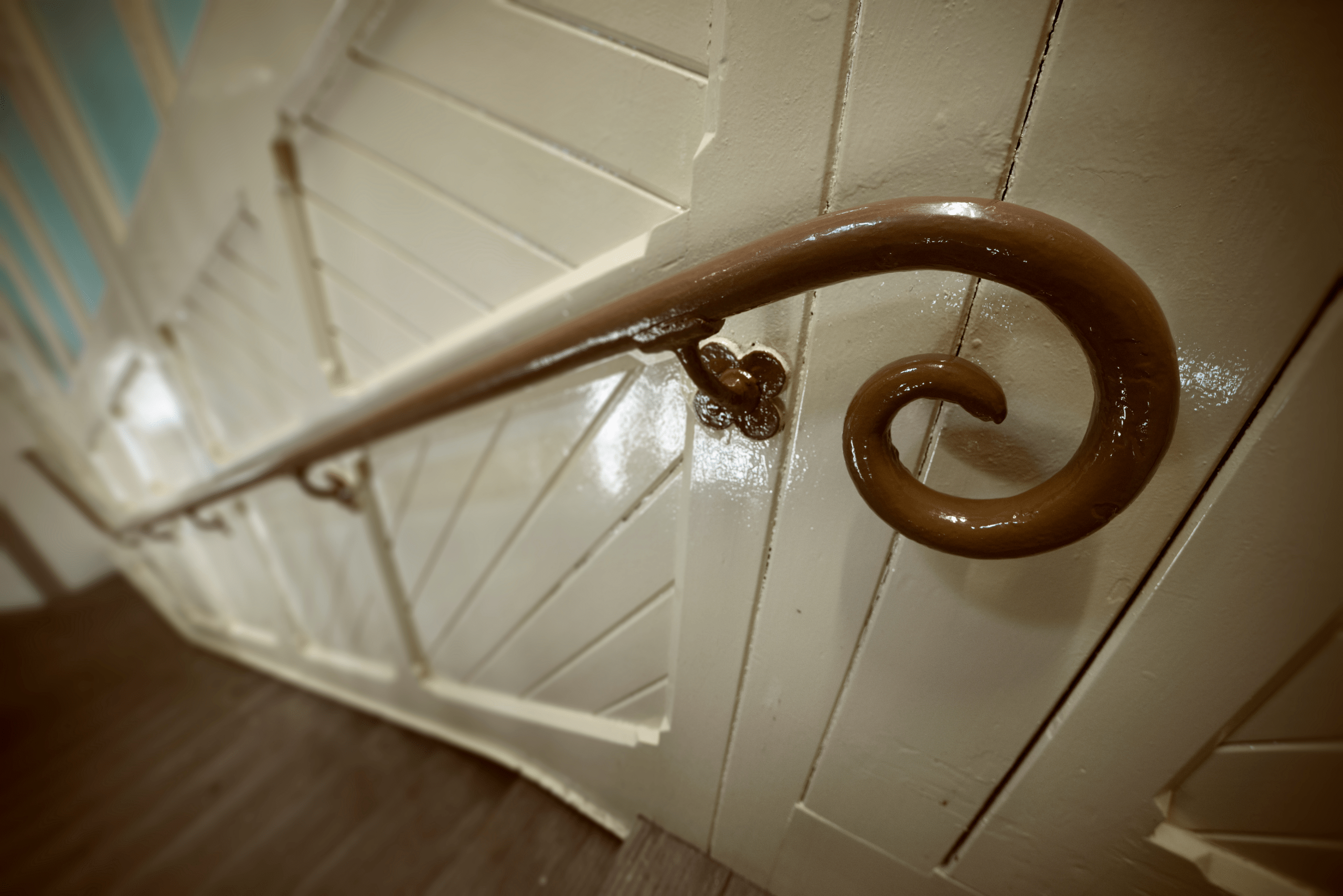 Hand railing mounted onto wall.