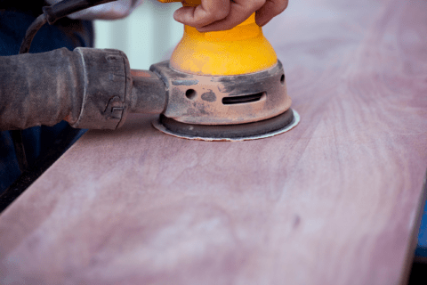 Orbital sander on wood.