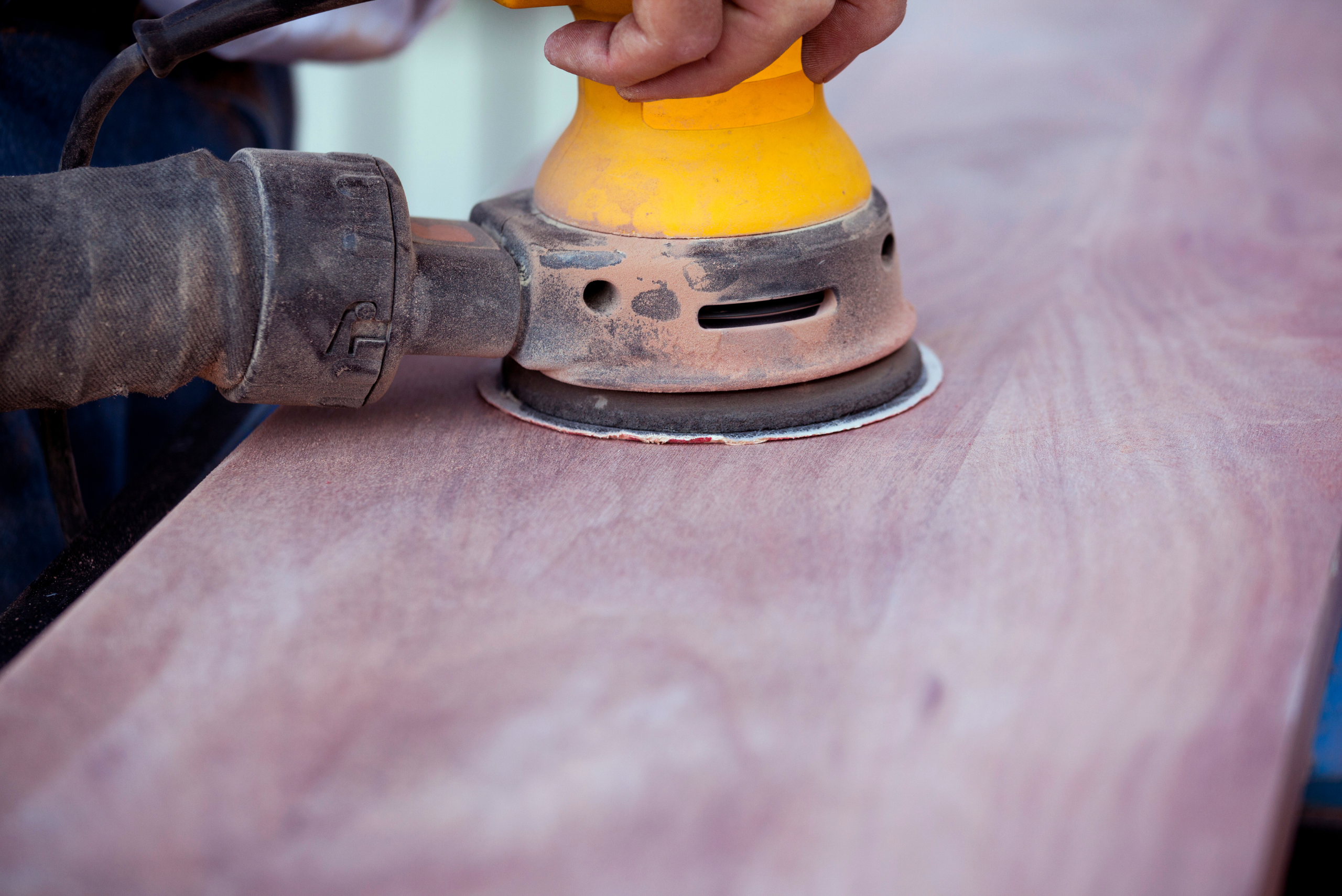 Orbital sander on wood.