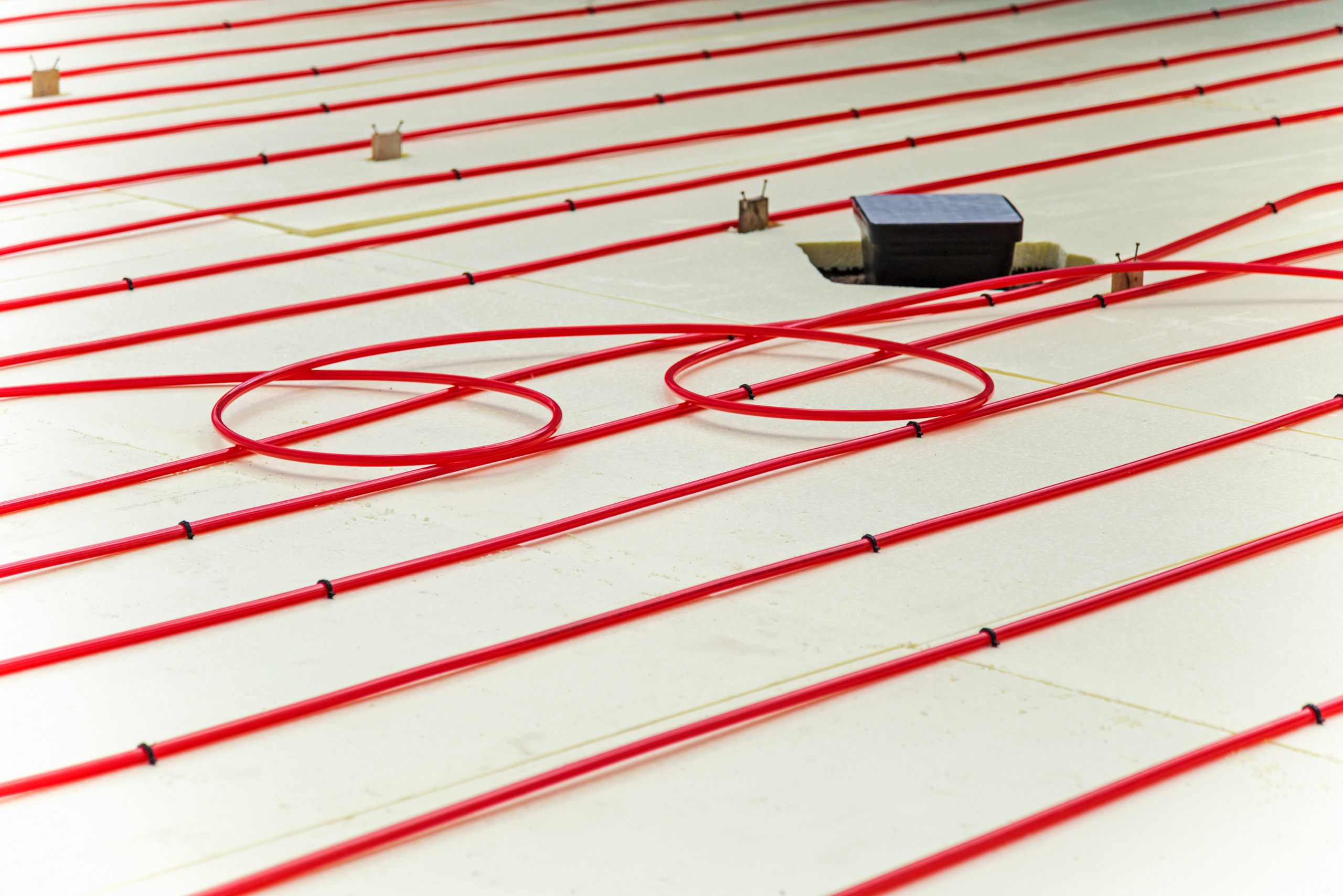 Floor heating elements exposed.