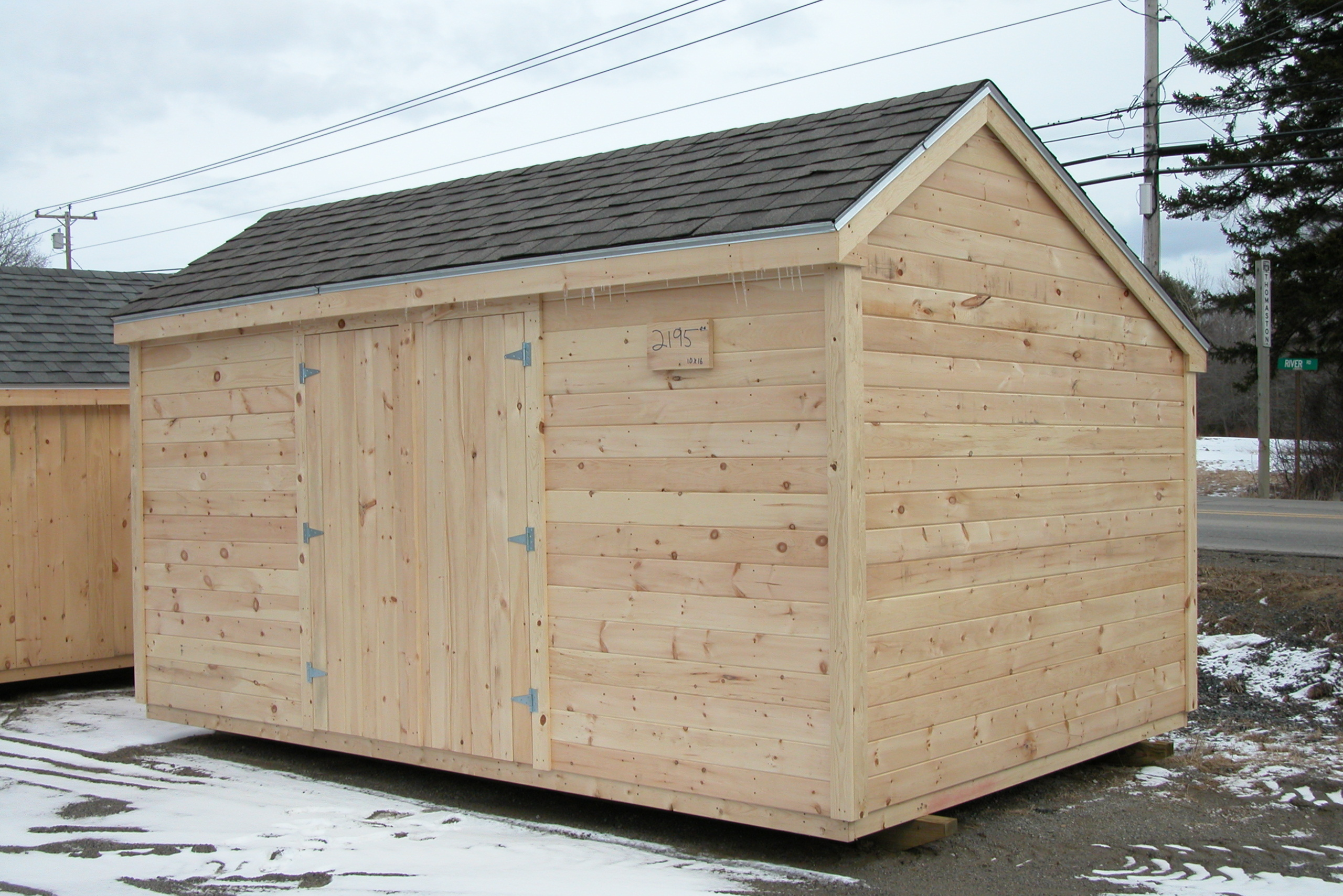 Wooden shed in winter.