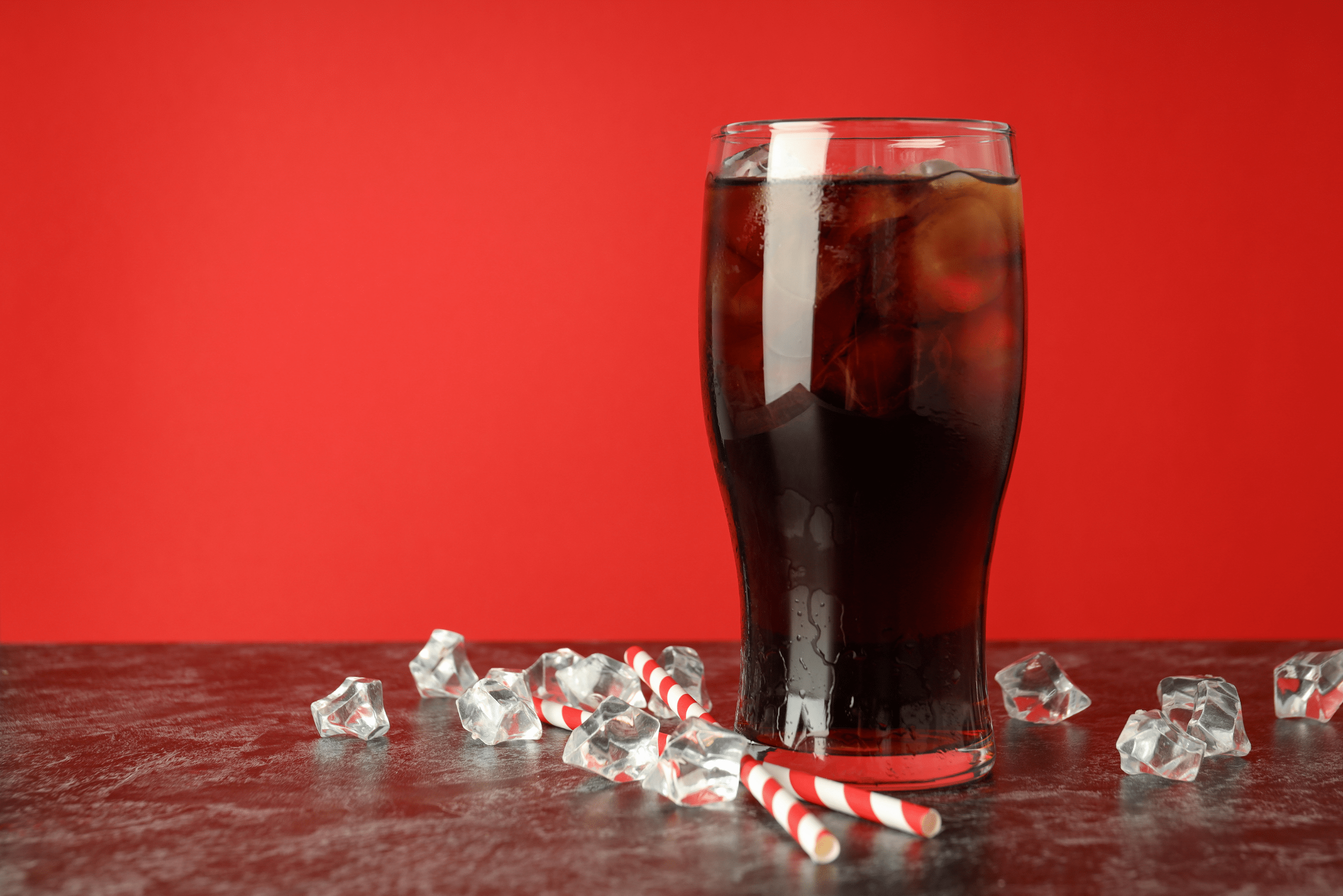 A glass of Coca Cola.