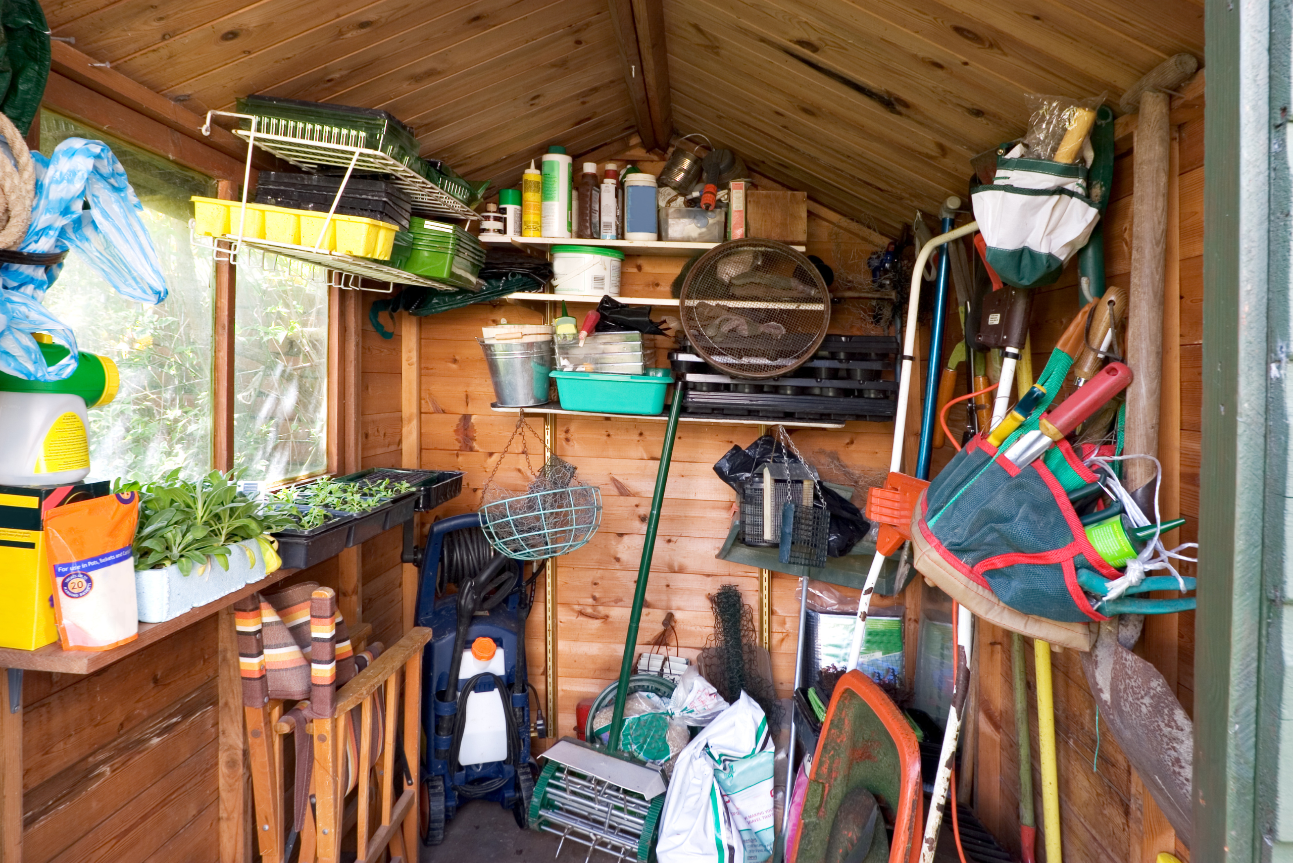 Shed full of gardening tools.