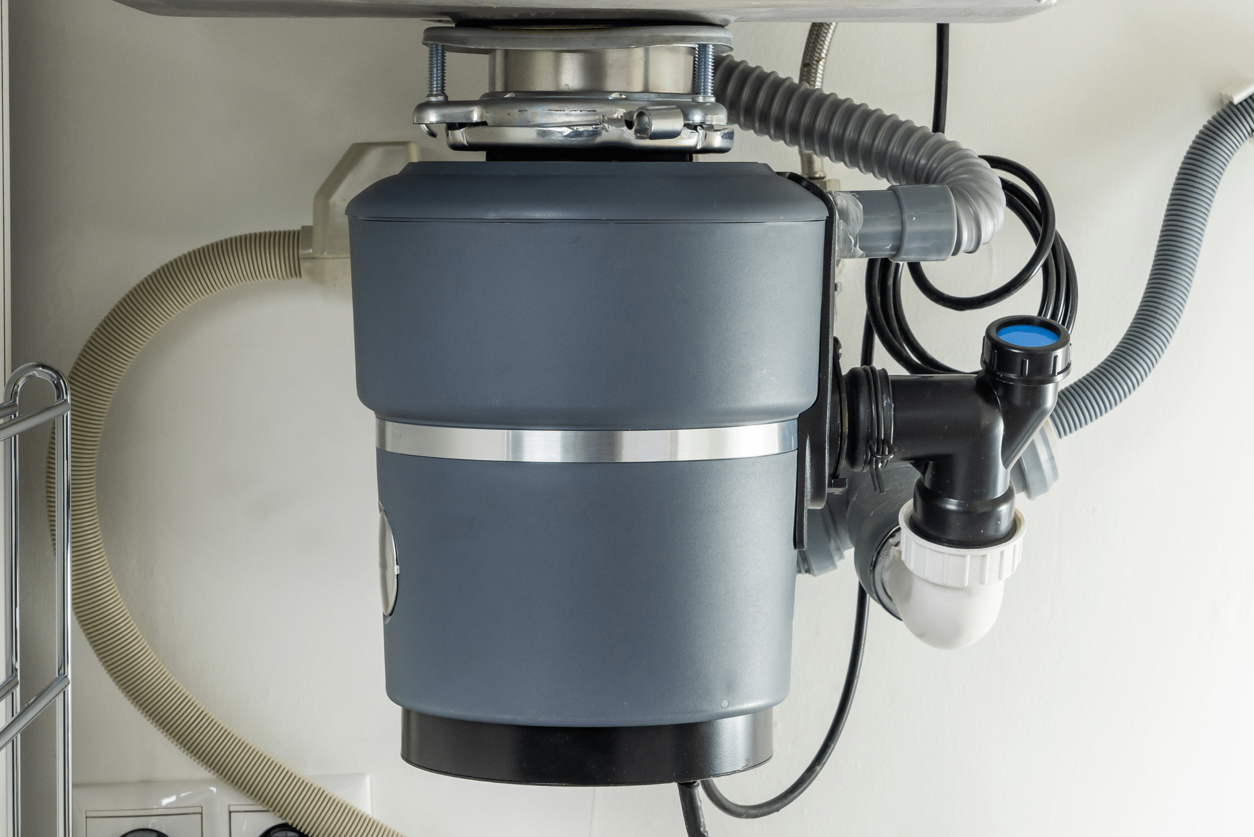 Under sink garbage disposal unit.