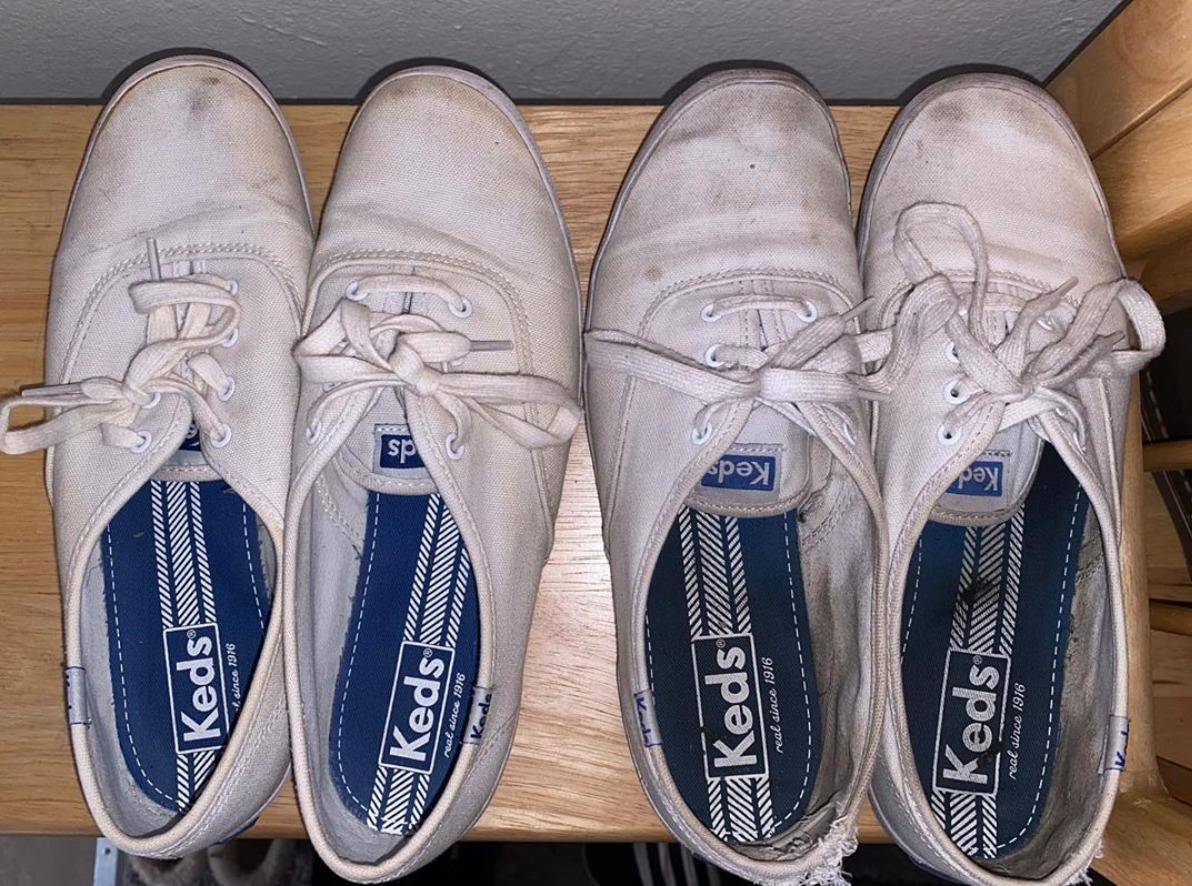 two pairs of dirty shoes