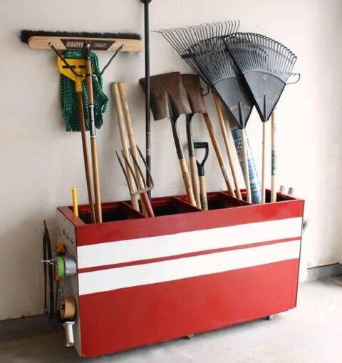 Red cabinet holding gardening supplies.