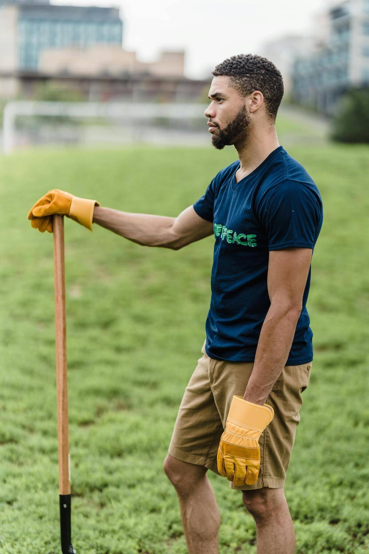 Man holding a shovel.