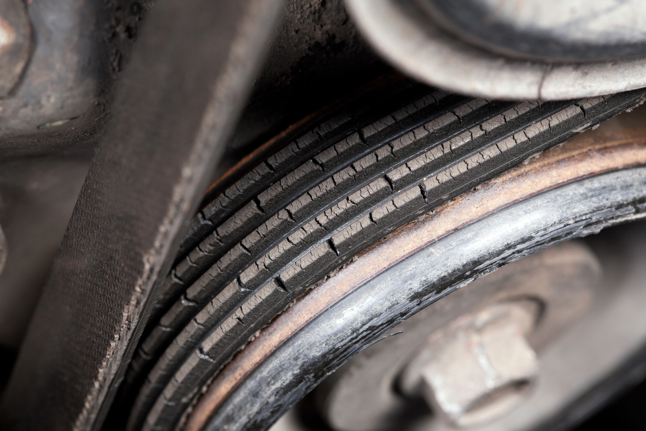 Closeup of a car engine belt.