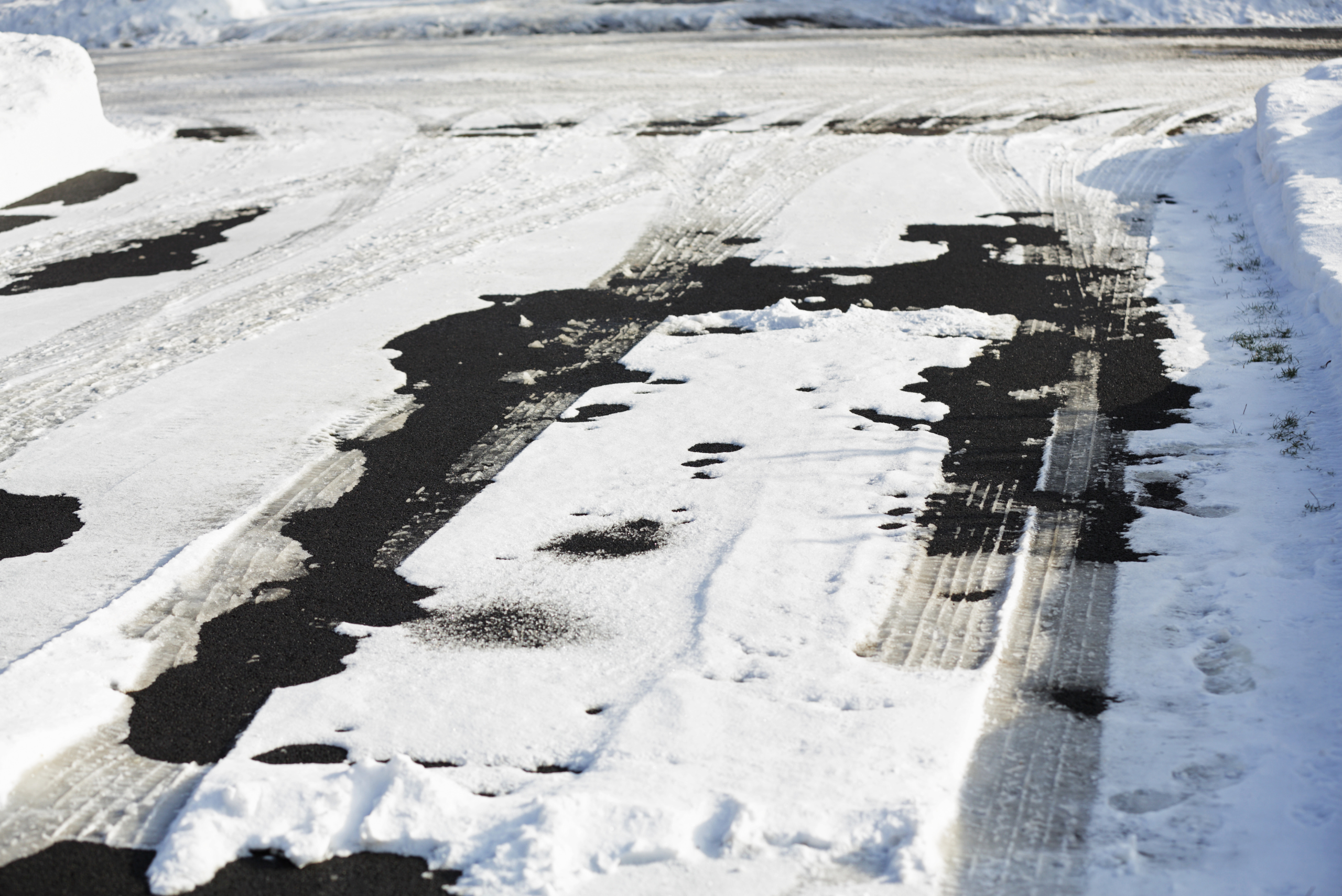 Driveway with snow on it.