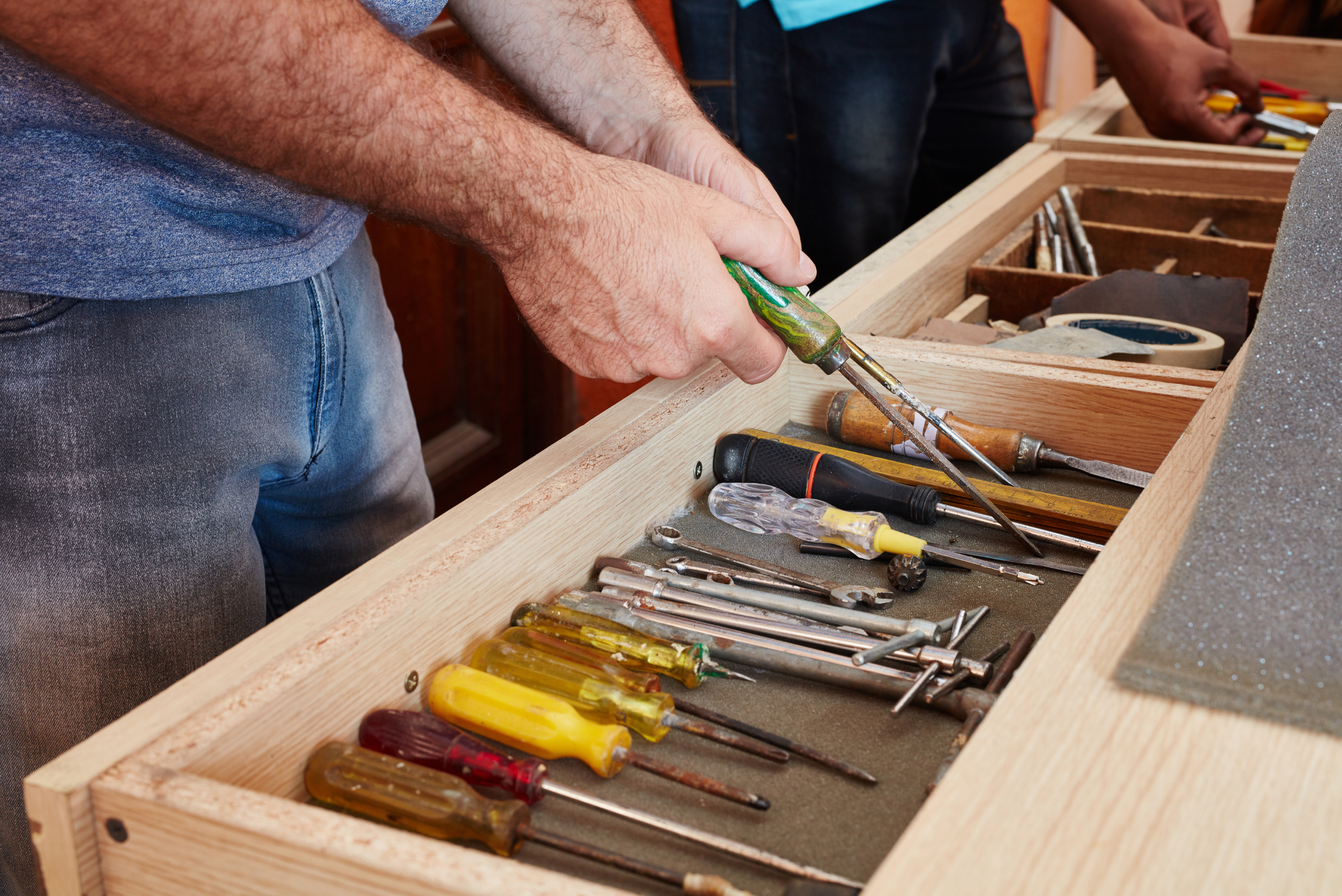 Organized wooden drawer.