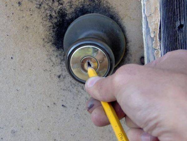 Pencil in door lock.