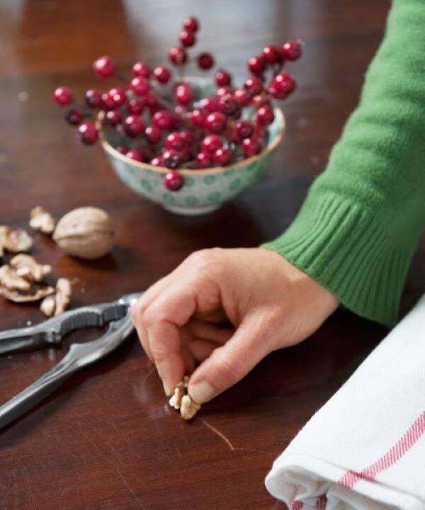 rubbing walnut on scratch.