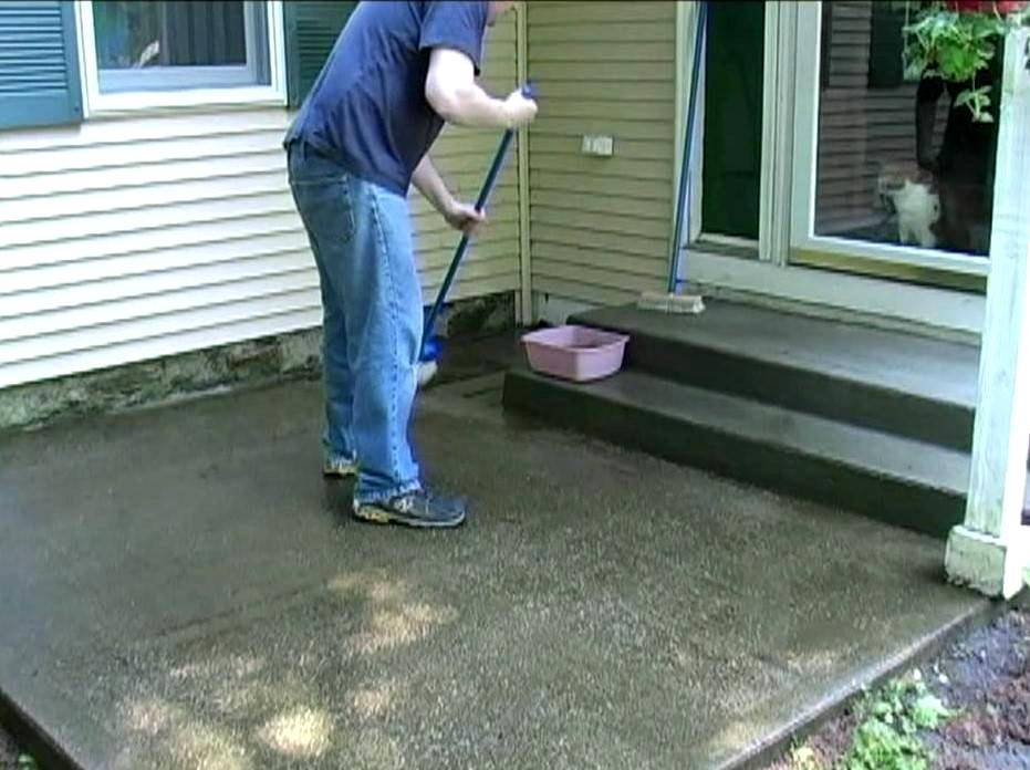 Man cleaning outdoors.