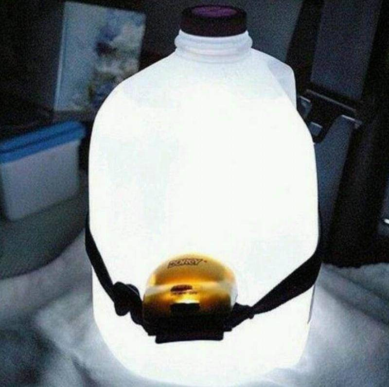 Milk jug with a light attached to it.