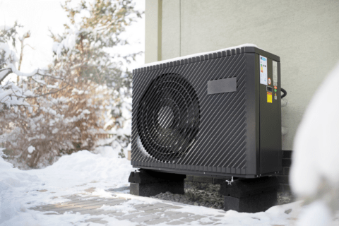 Black heat pump unit for a home.