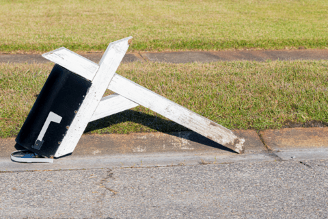 Mailbox on the ground.