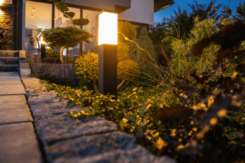 Lighting in the front yard of a house.